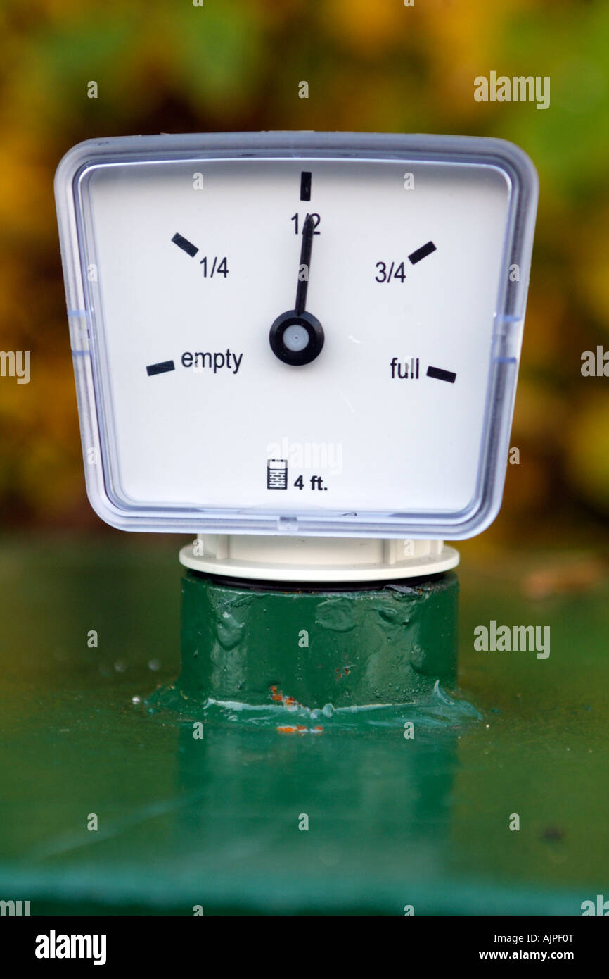 Oil Tank Gauge to Meter Quantity of Fuel Empty Half Full Stock Photo