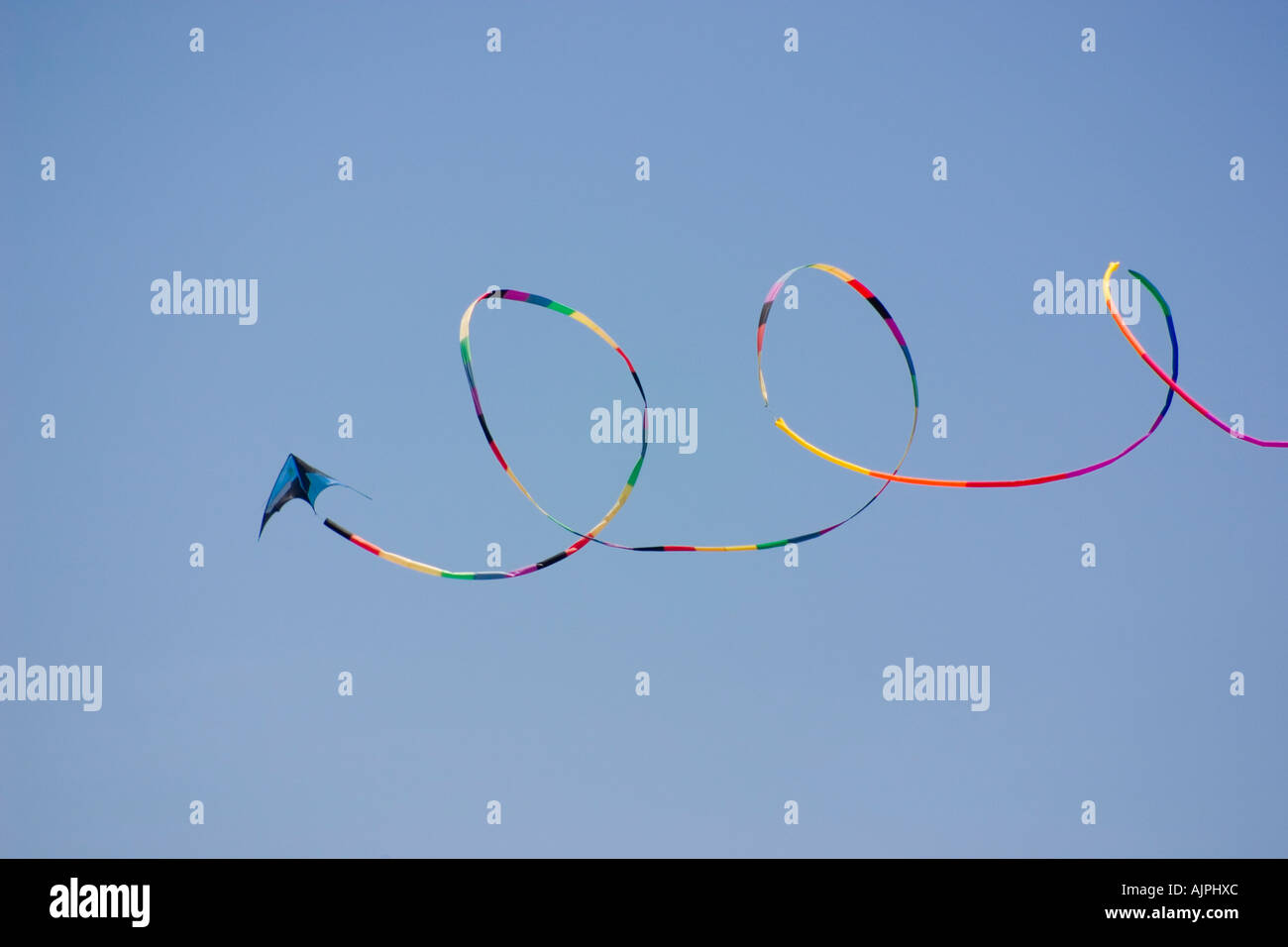 Blue kite with long tail hires stock photography and images Alamy