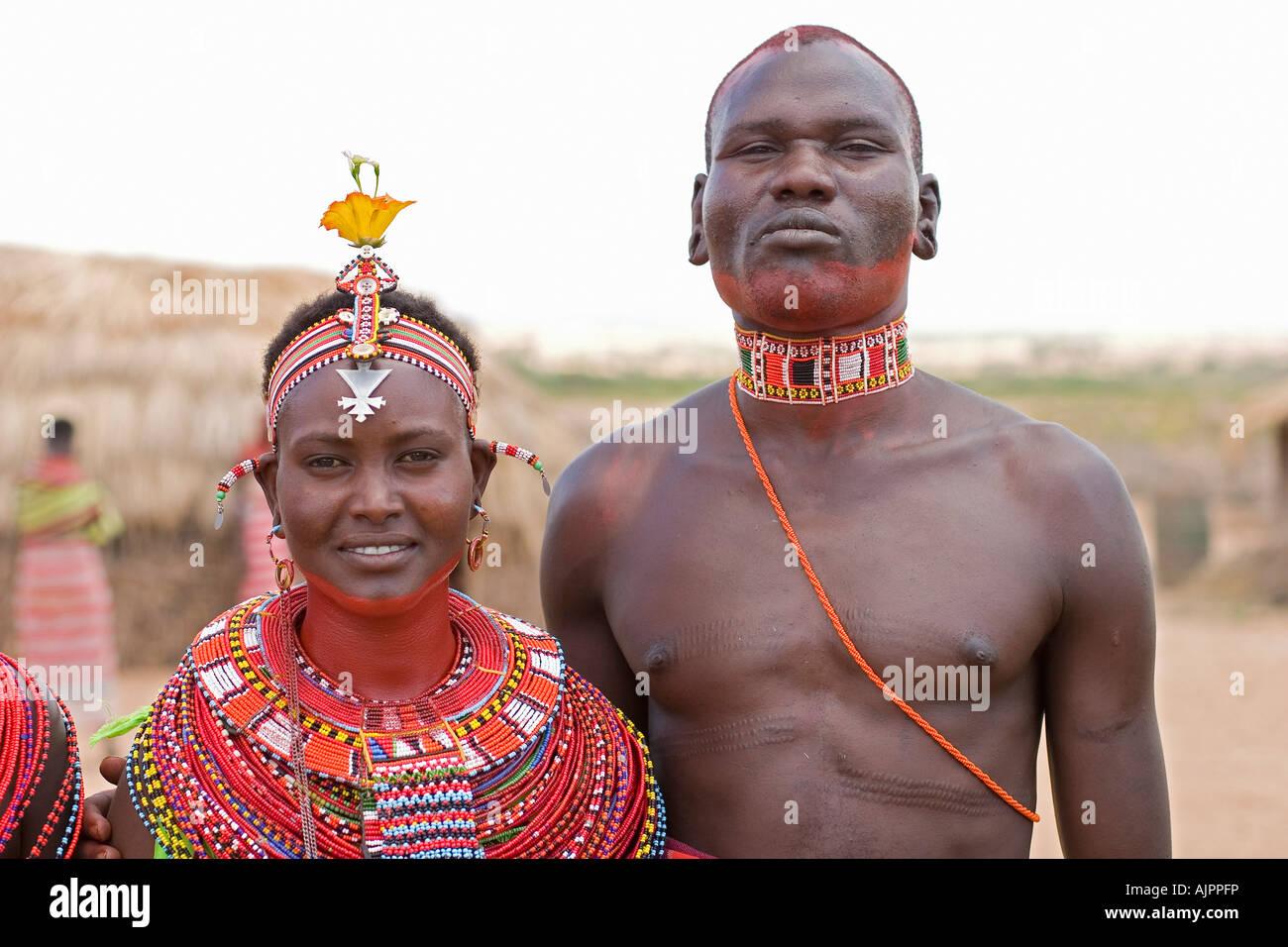 Samburu woman and man in traditional decoration and clothing Stock Photo