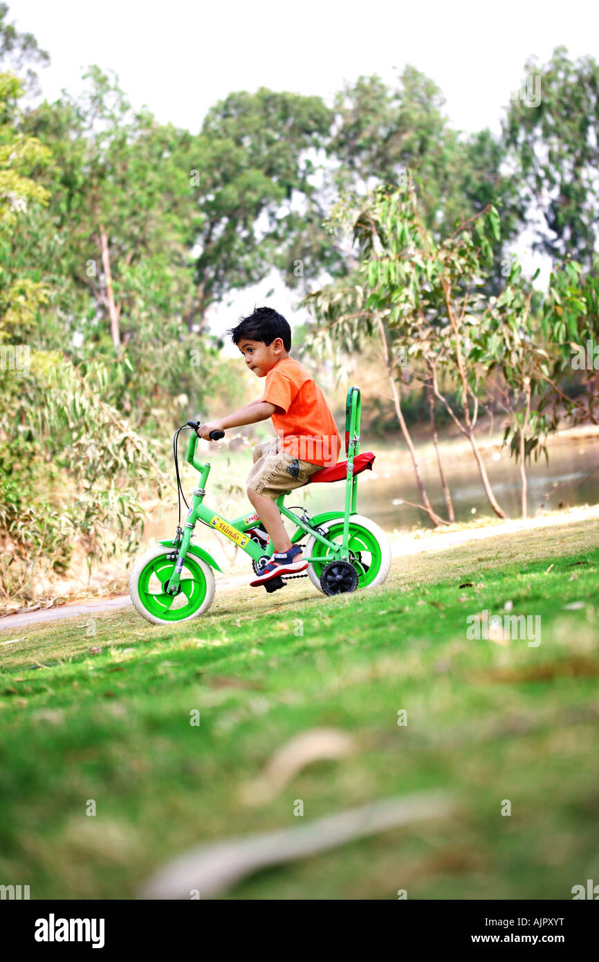 a-young-kid-riding-his-cycle-stock-photo-alamy