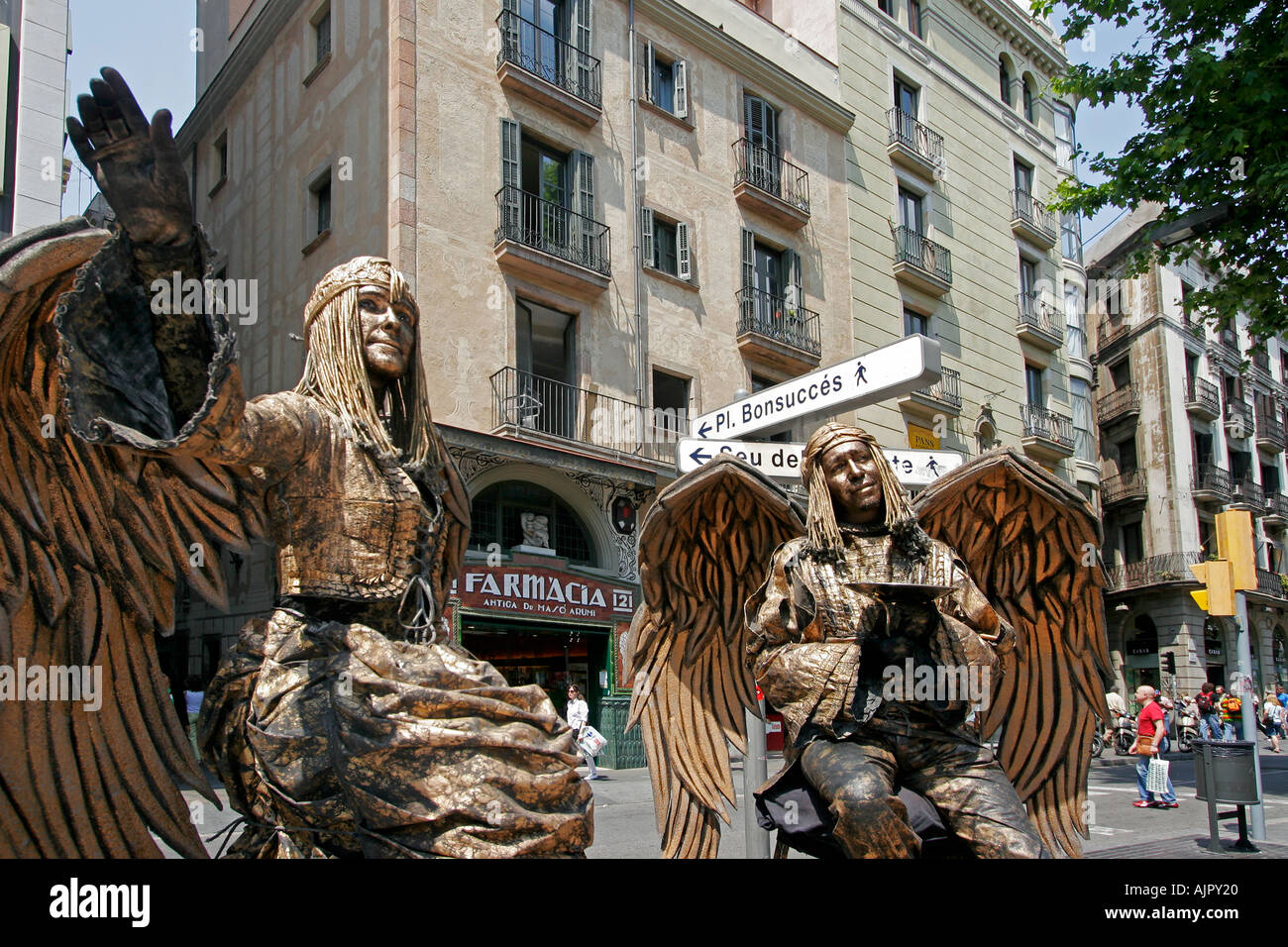spain Barcelona ramblas street artists angel costums Stock Photo