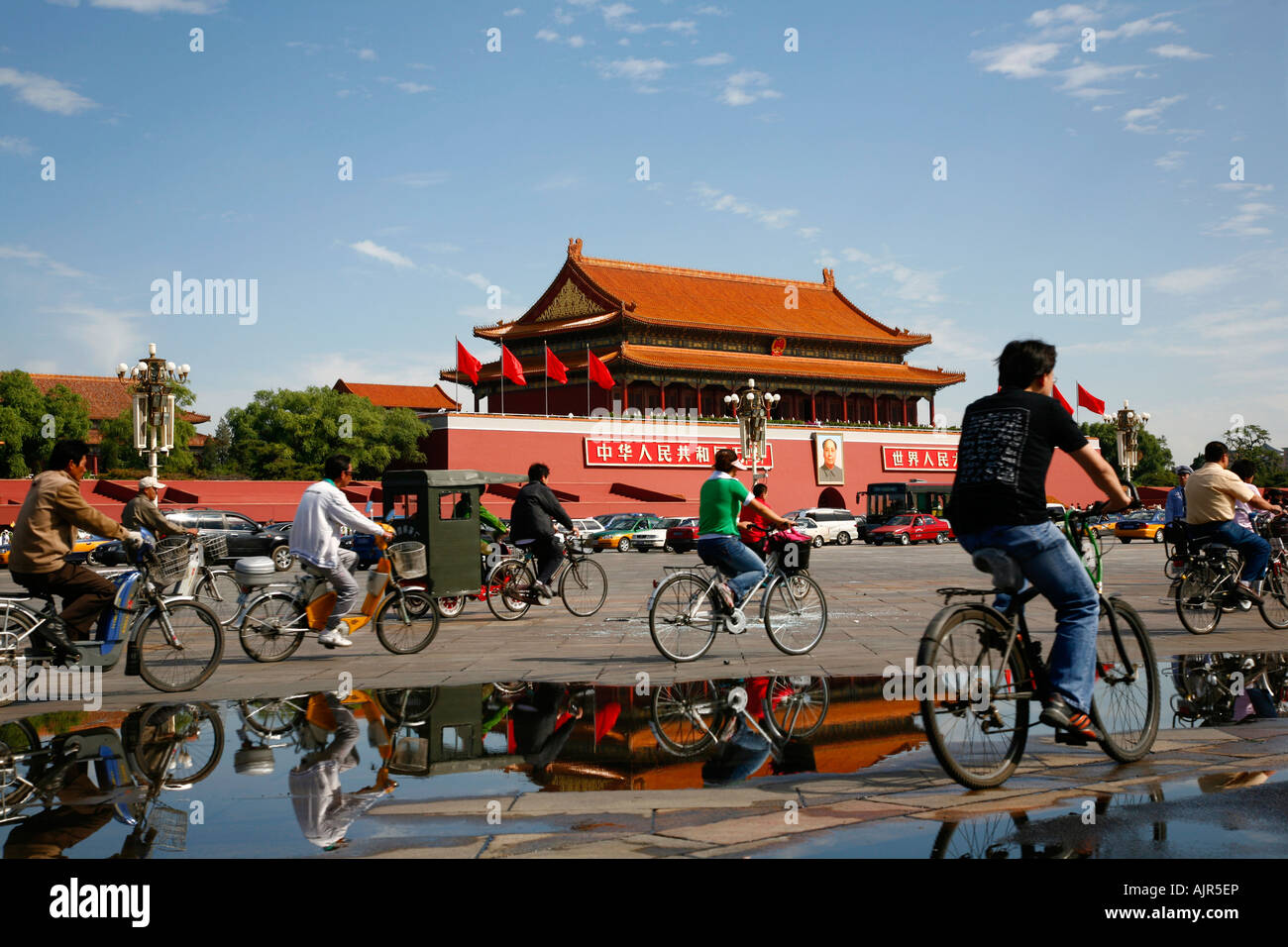 Bicycles passing by the Gate of heavenly peace the Forbidden city Tiananmen square Beijing China Stock Photo
