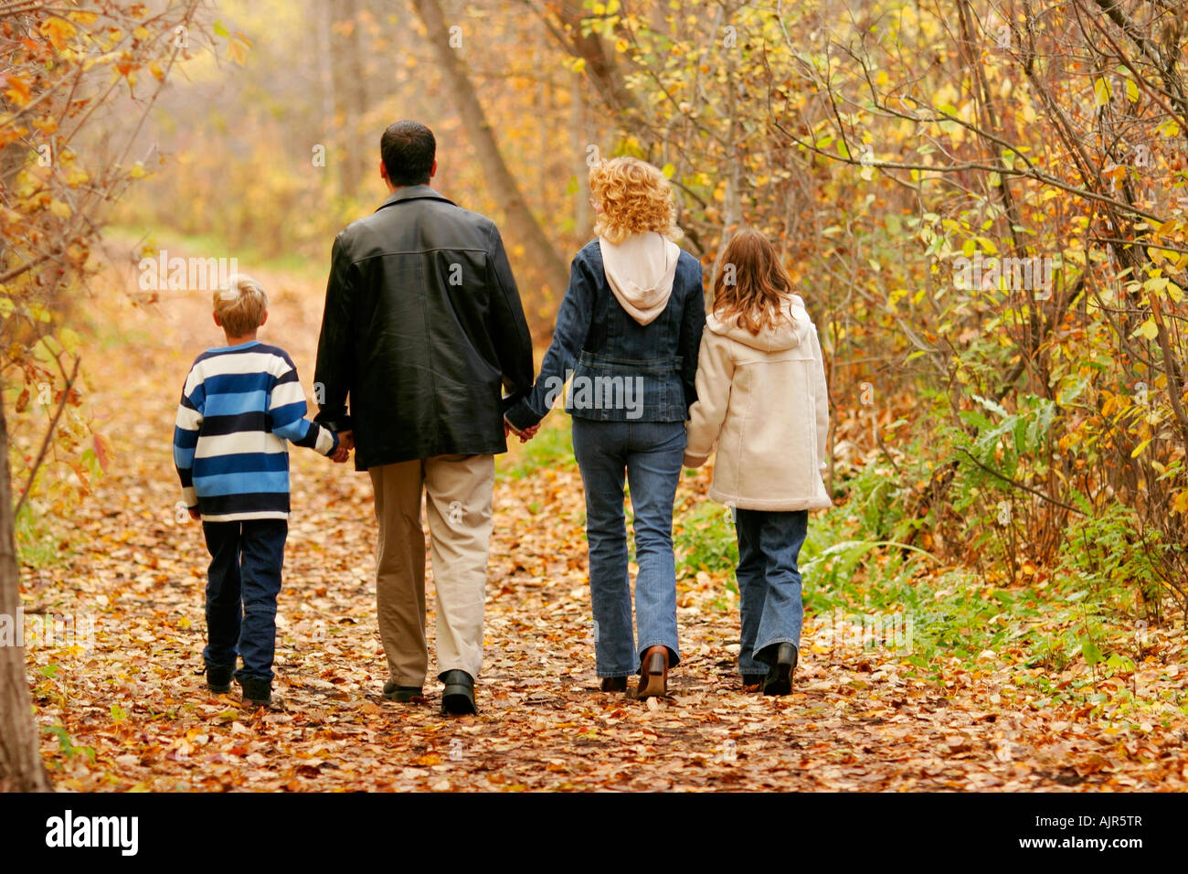 Family walking together Stock Photo