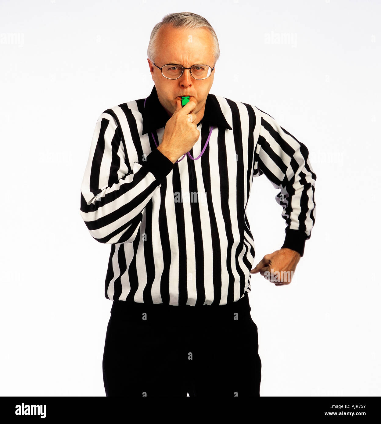 Referee blowing a whistle Stock Photo Alamy