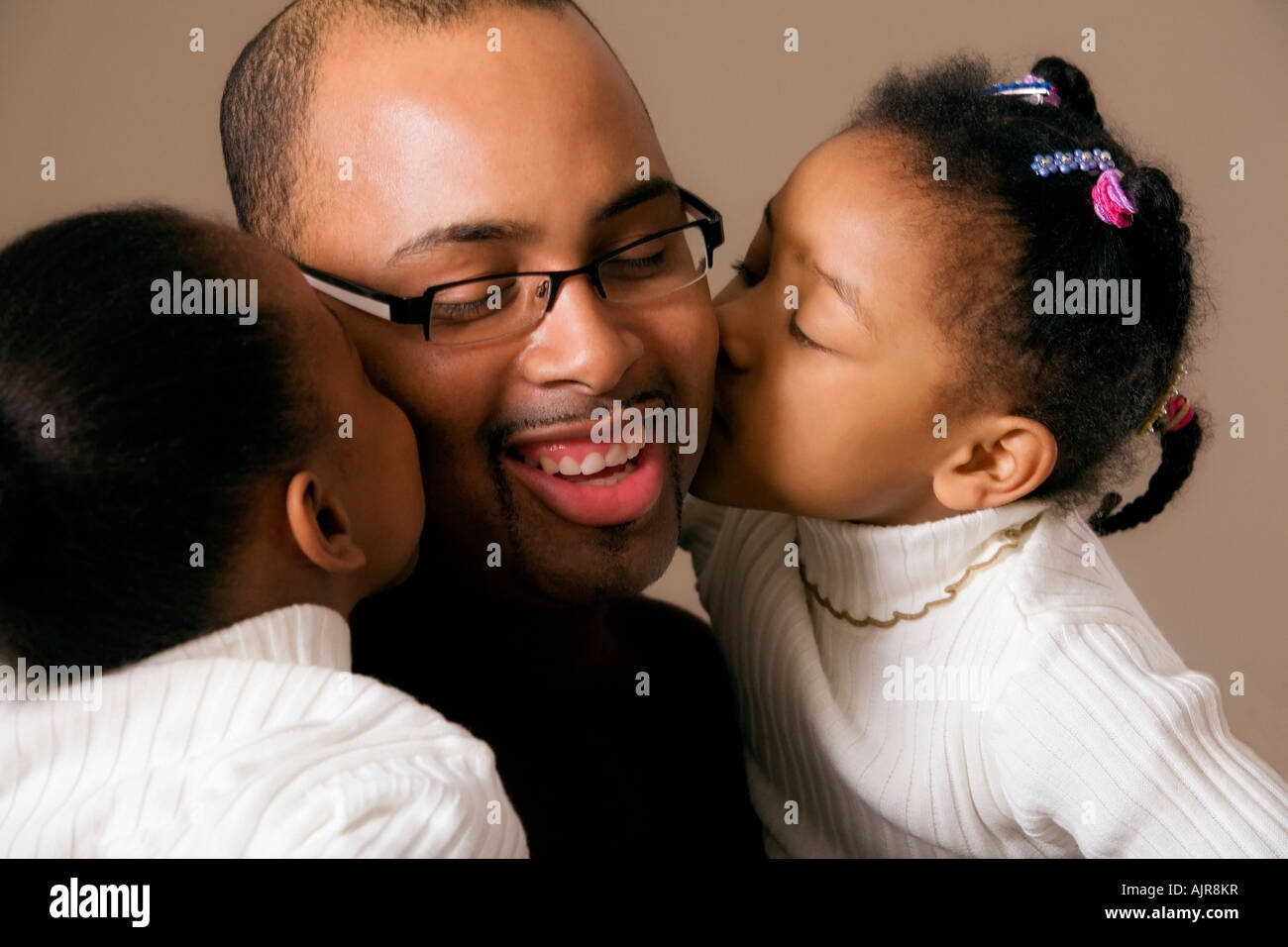 Parents kissing their children hi-res stock photography and images - Page 9  - Alamy