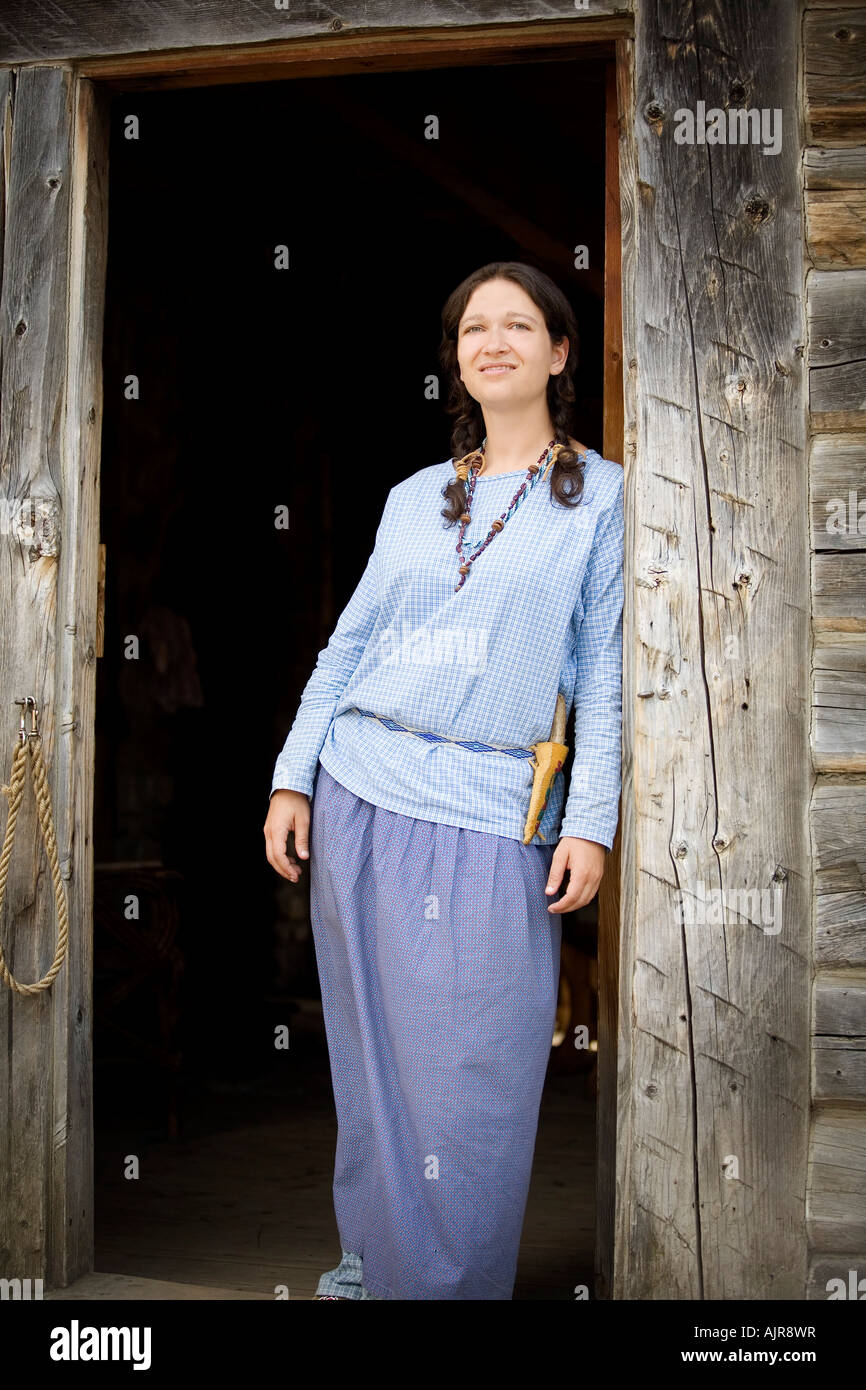 Front view of a woman standing at the door Stock Photo - Alamy