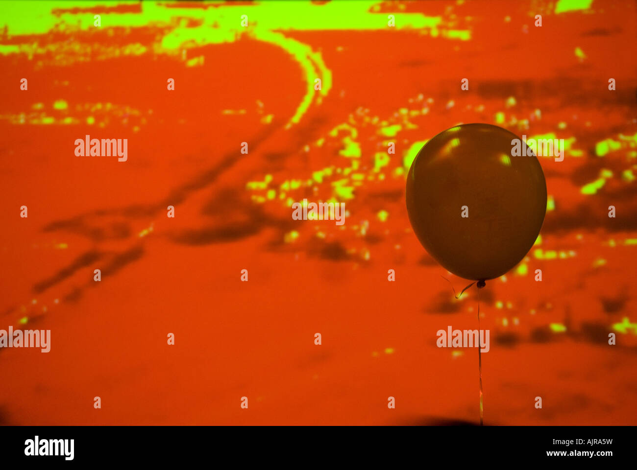 Single red Balloon isolated in front an abstract background Stock Photo Alamy