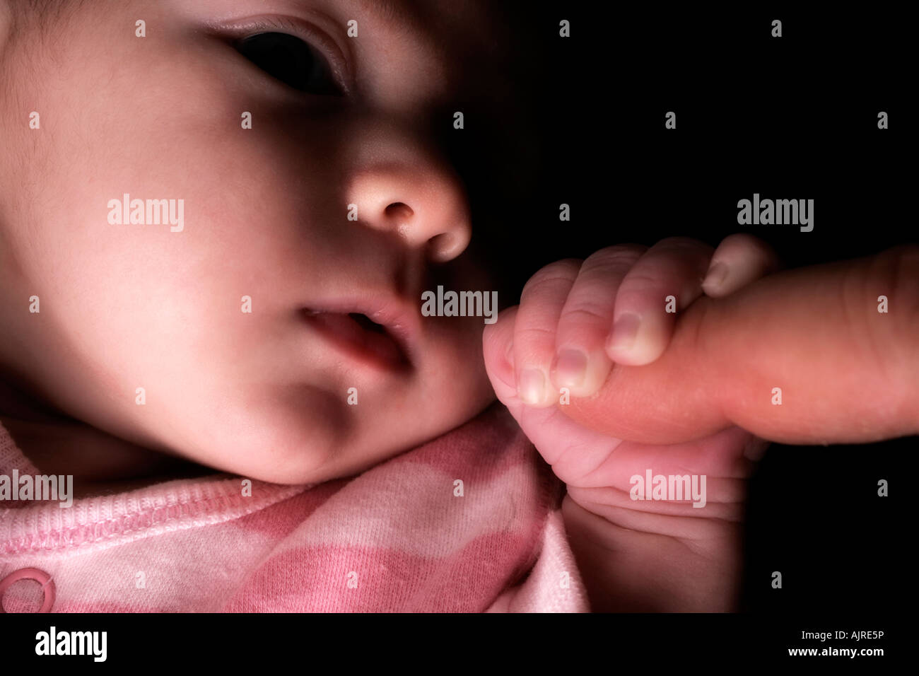 baby and finger Stock Photo