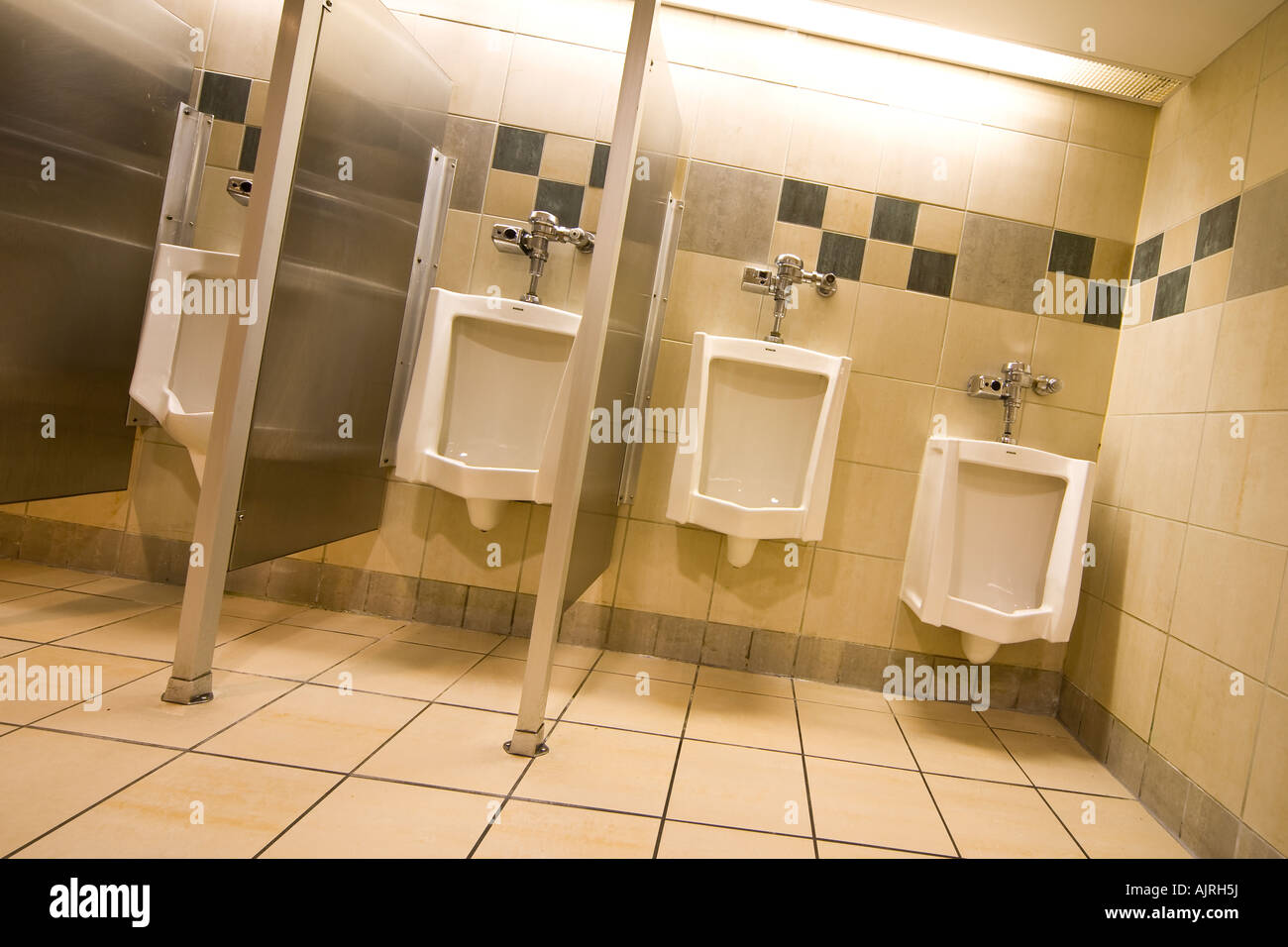 https://c8.alamy.com/comp/AJRH5J/public-toilet-typical-american-mens-room-urinals-AJRH5J.jpg