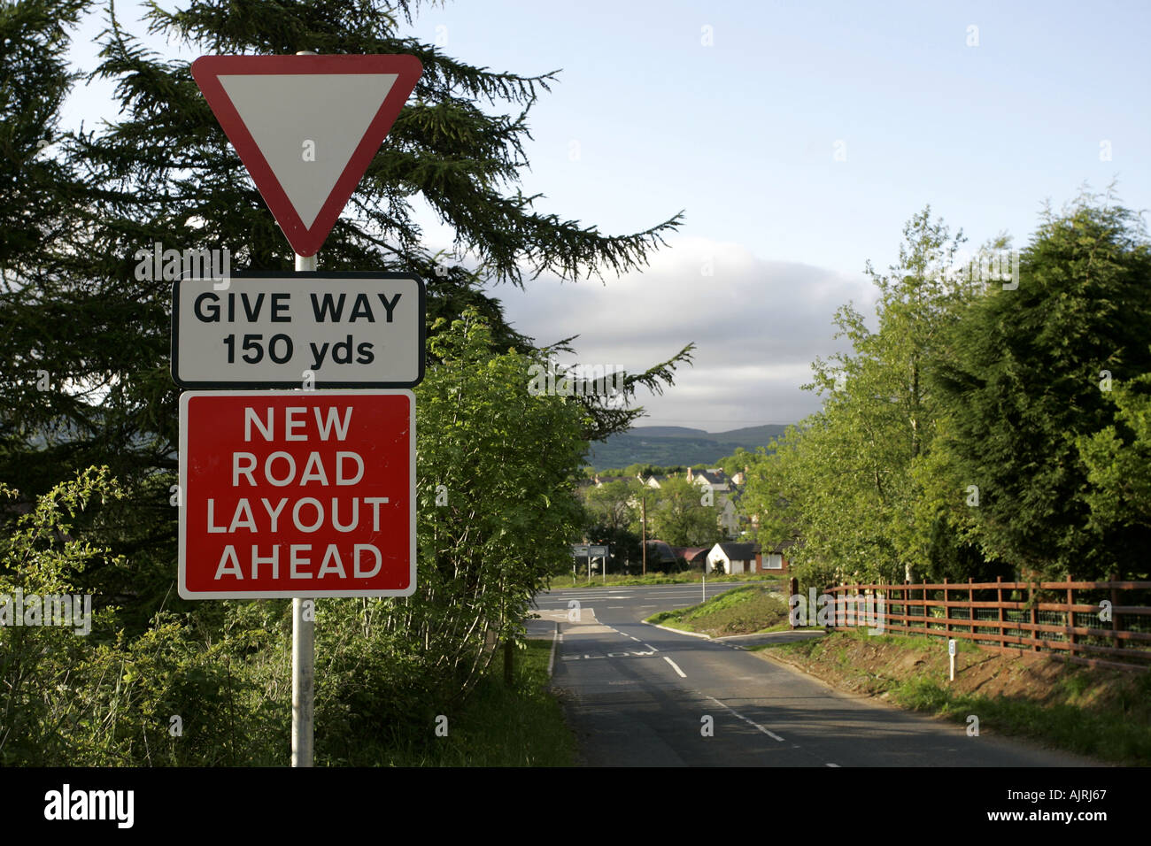 Give Way new road layout sign county antrim northern ireland Stock Photo