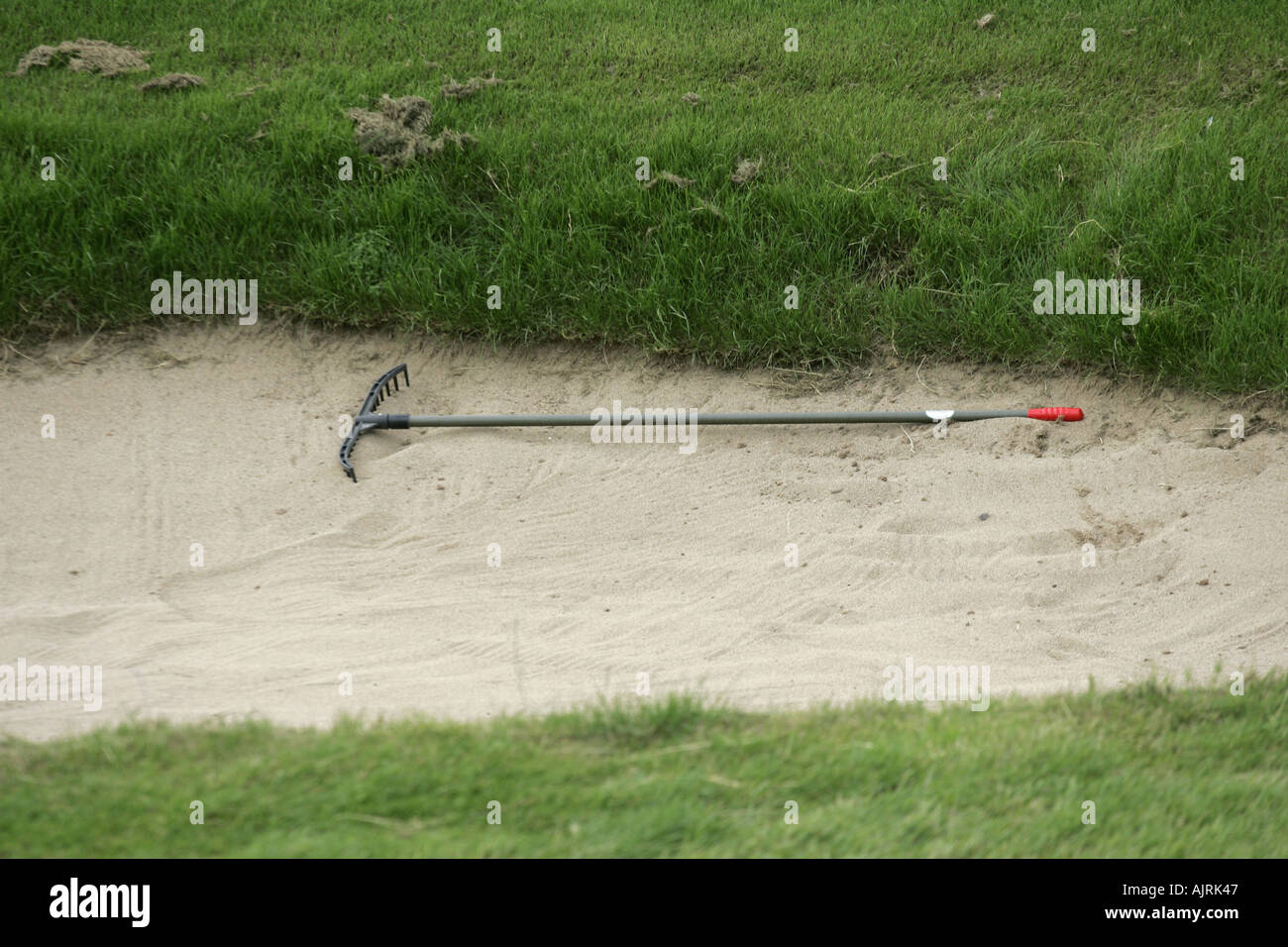 Golf bunker rake hi-res stock photography and images - Alamy