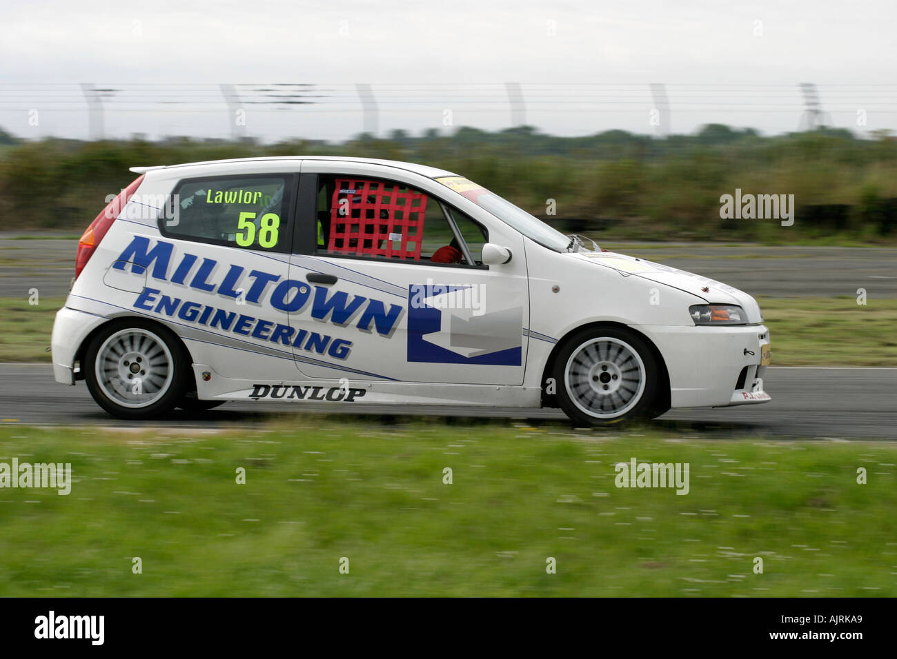 Fiat Punto Abarth racing at Kirkistown Circuit county down Northern Ireland side view white Stock Photo