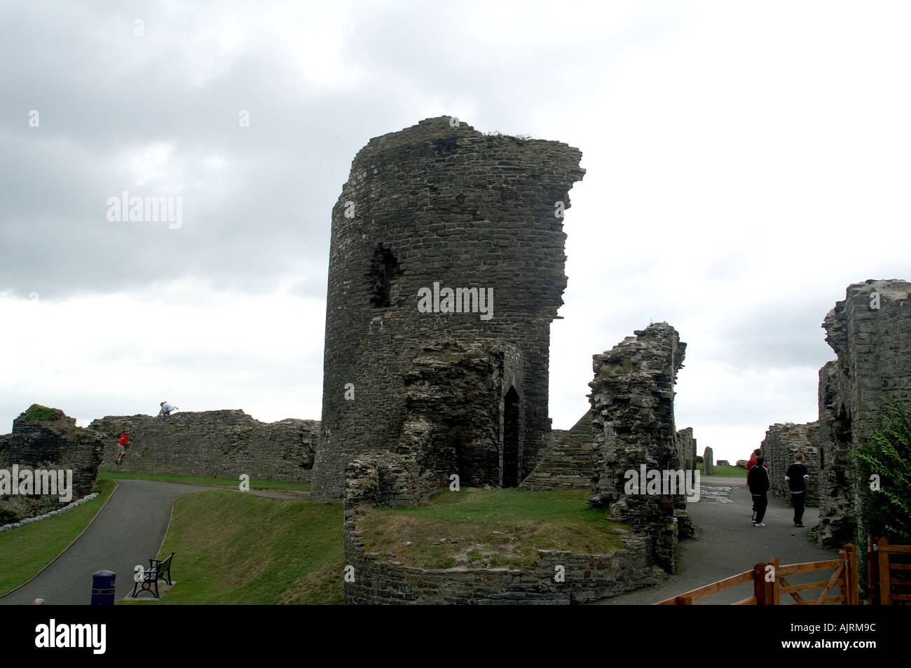 Walls of ruined castle beside sea at aberystwith aberystwyth cardigan bay Ceredigion Wales United Kingdom Great Britain Stock Photo