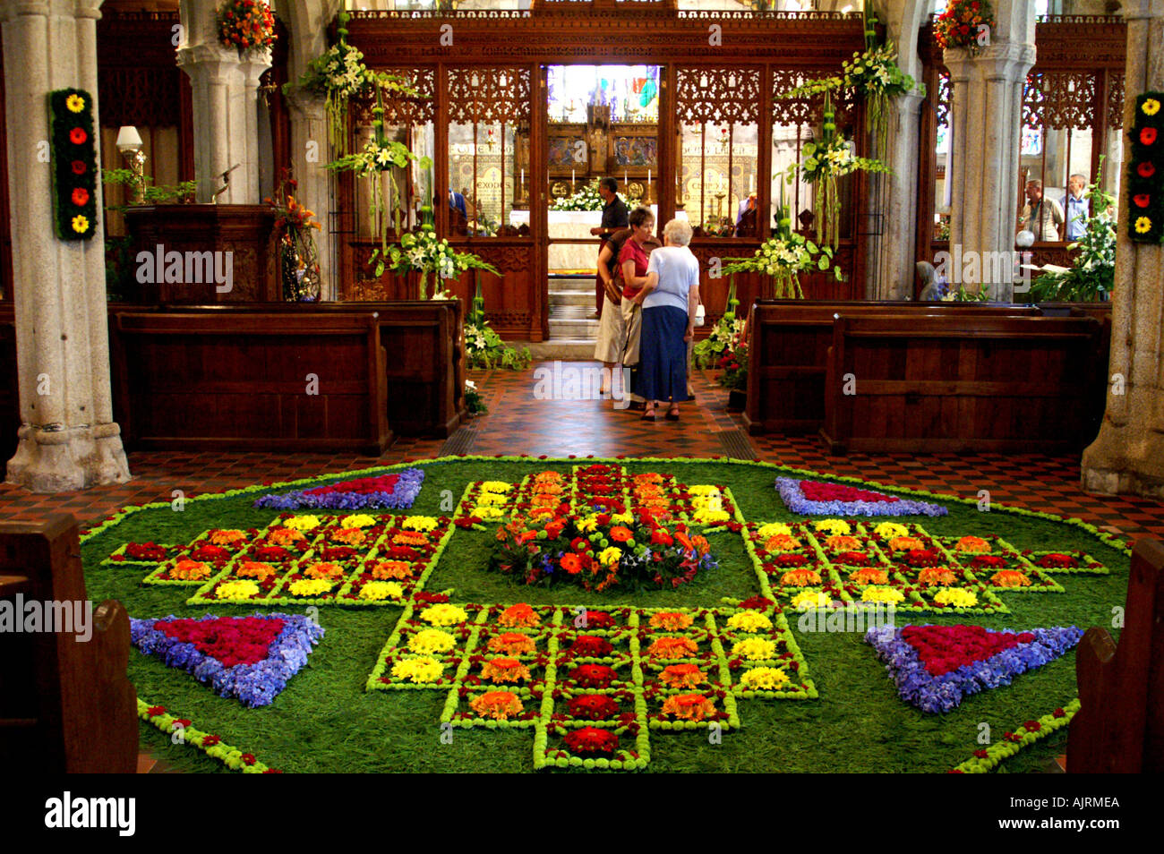 Flower festival inside St Neot s parish church Cornwall England Stock