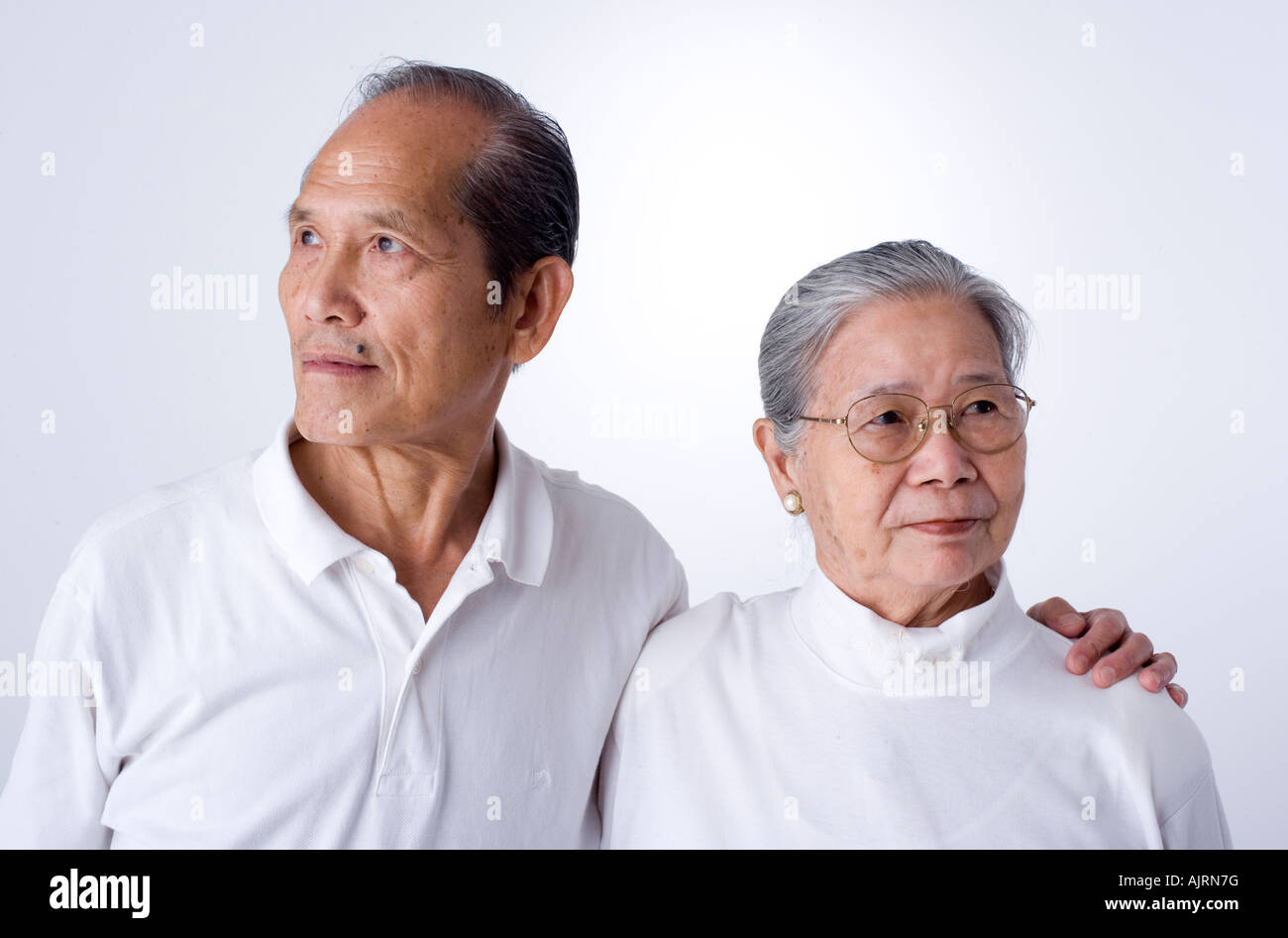 Couple with arm around each other hi-res stock photography and images ...