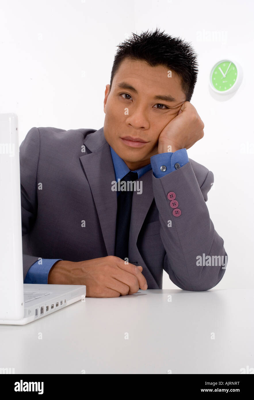 Businessman bored at work Stock Photo Alamy