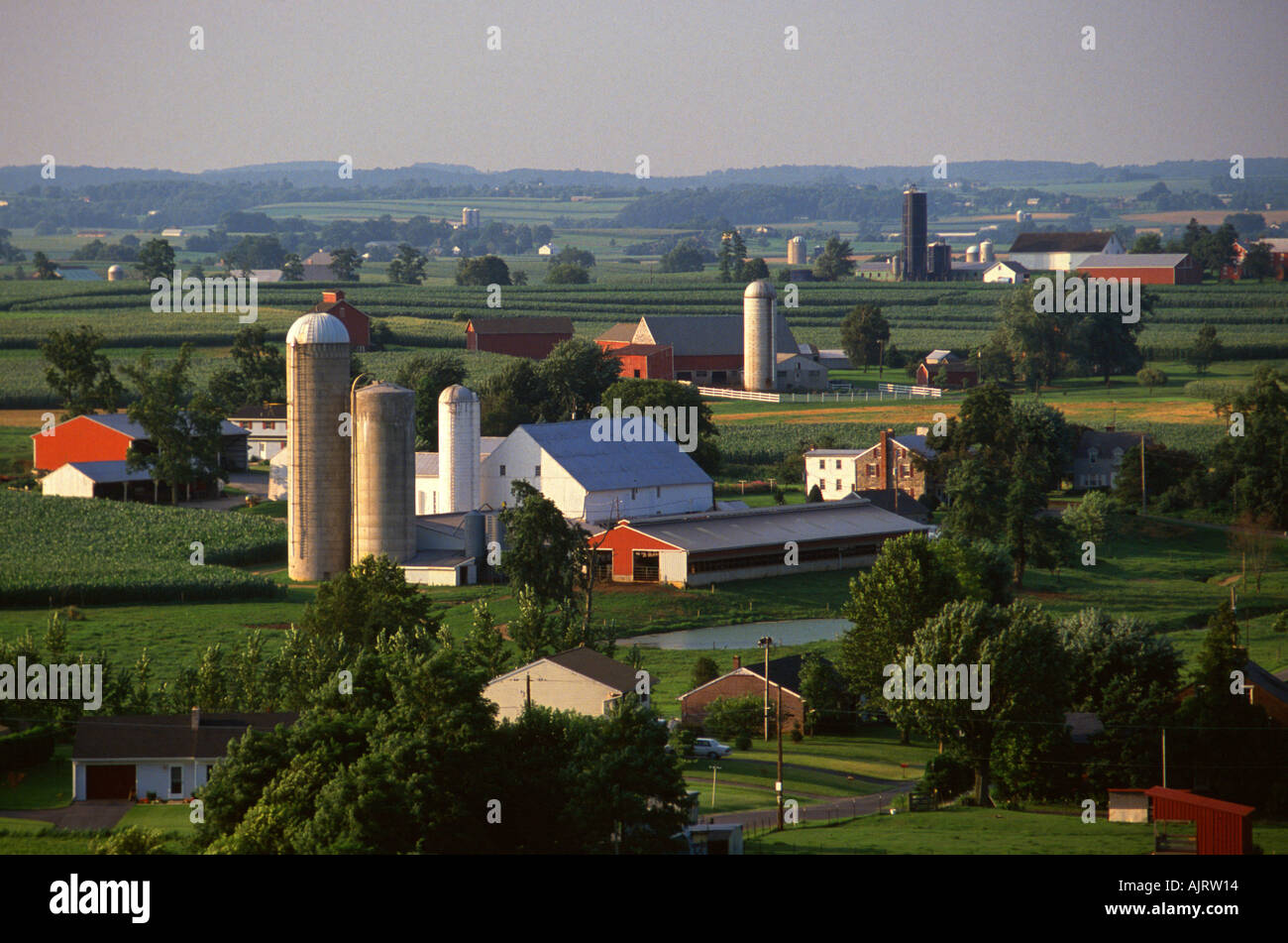 High density community of dairy farms surrounded by corn soybean and alfalfa fields in Lancaster County Pennsylvania USA Stock Photo