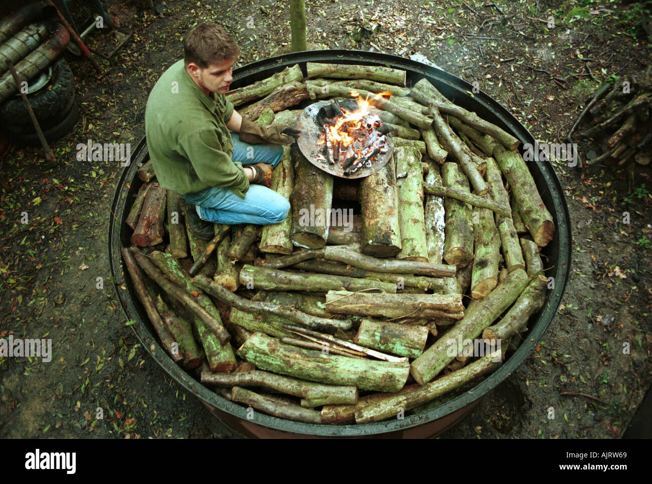 A charcoal burner at work in Warwickshire Stock Photo Alamy