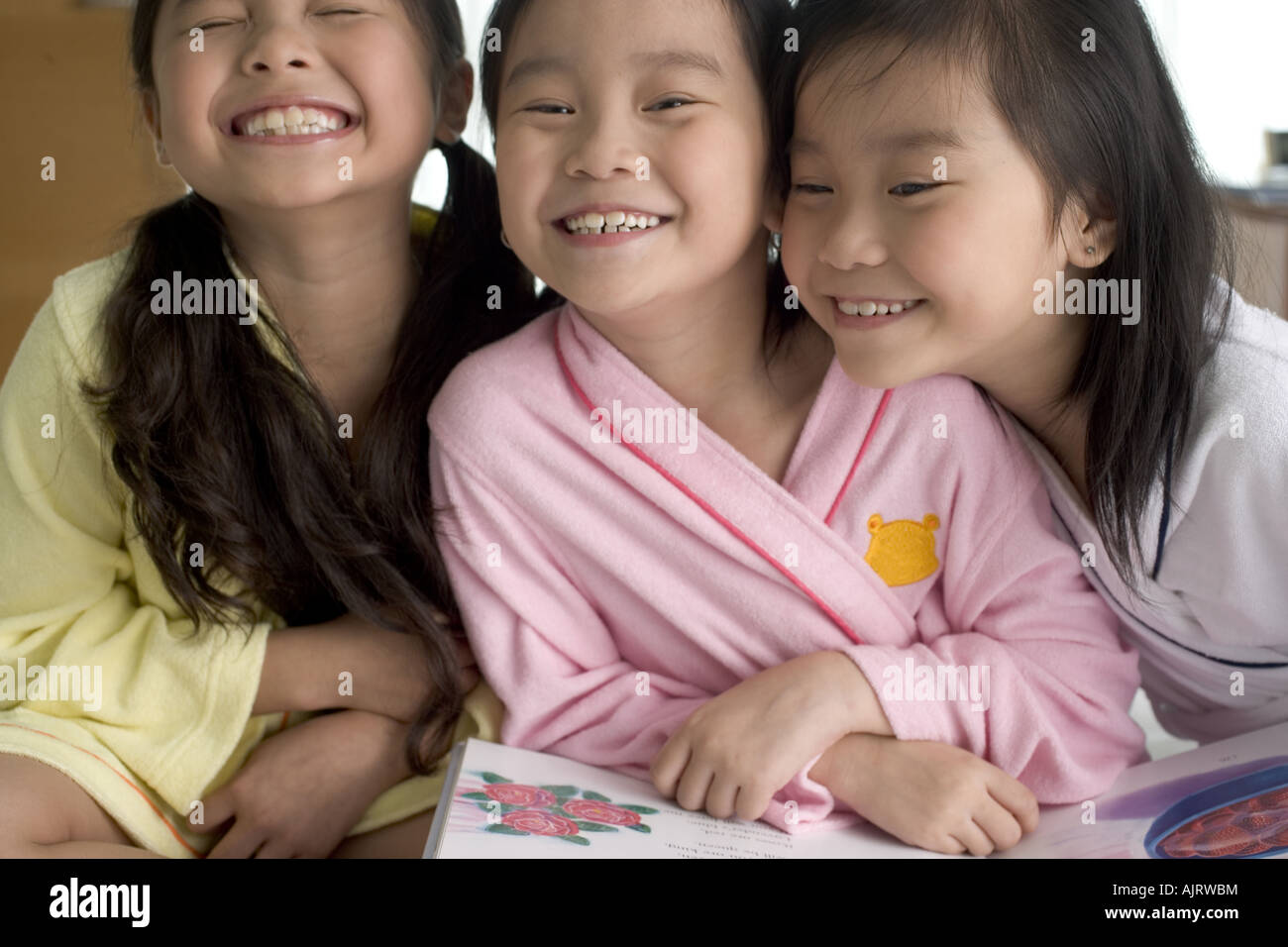 Close-up of three girls smiling Stock Photo - Alamy
