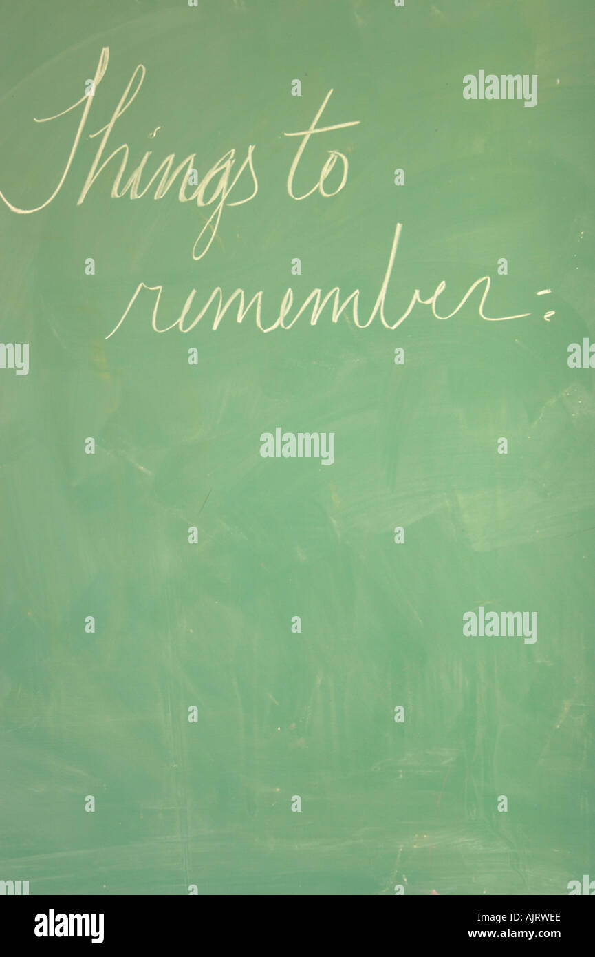 A note on a chalk board which says things to remember Stock Photo