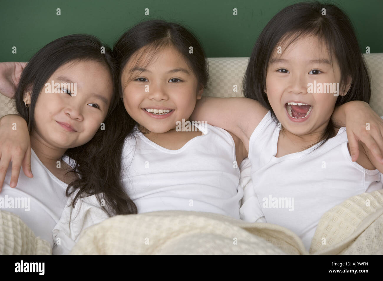 Close-up of three girls smiling Stock Photo - Alamy