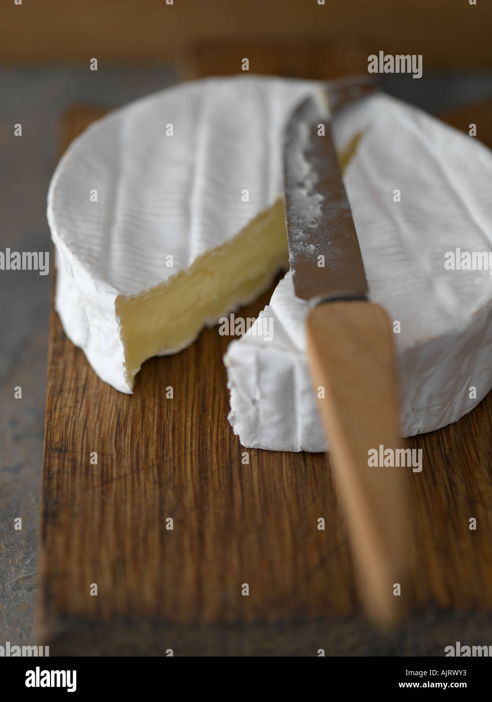 Camembert on chopping board with cheeses knife - high end Hasselblad 61mb digital image Stock Photo