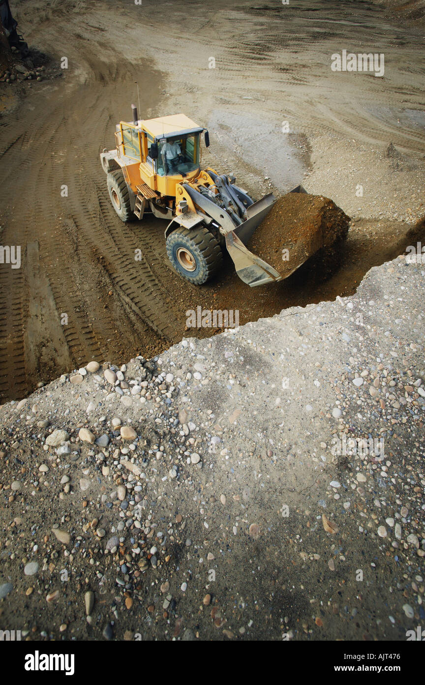 Tractor moving dirt Stock Photo Alamy