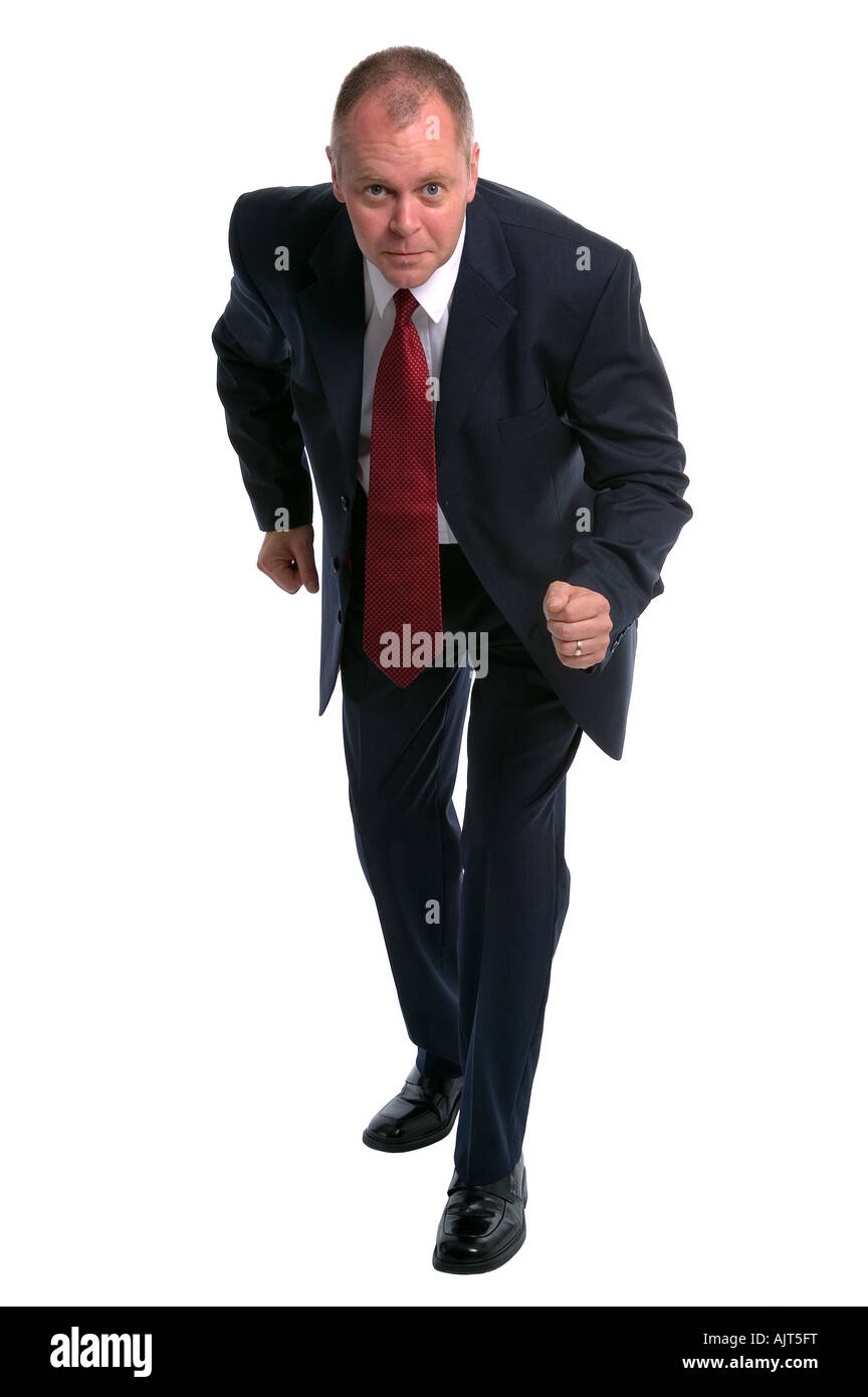 Businessman in starting position getting ready to race Stock Photo