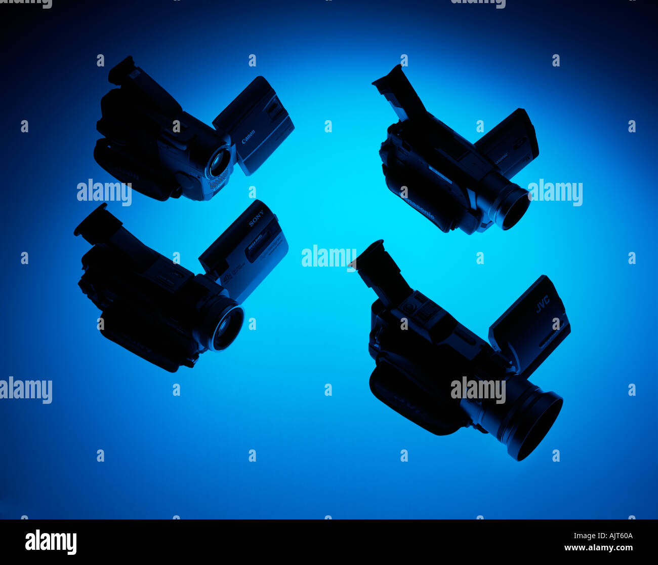 Various brands of camcorders against a blue backlit background Stock Photo