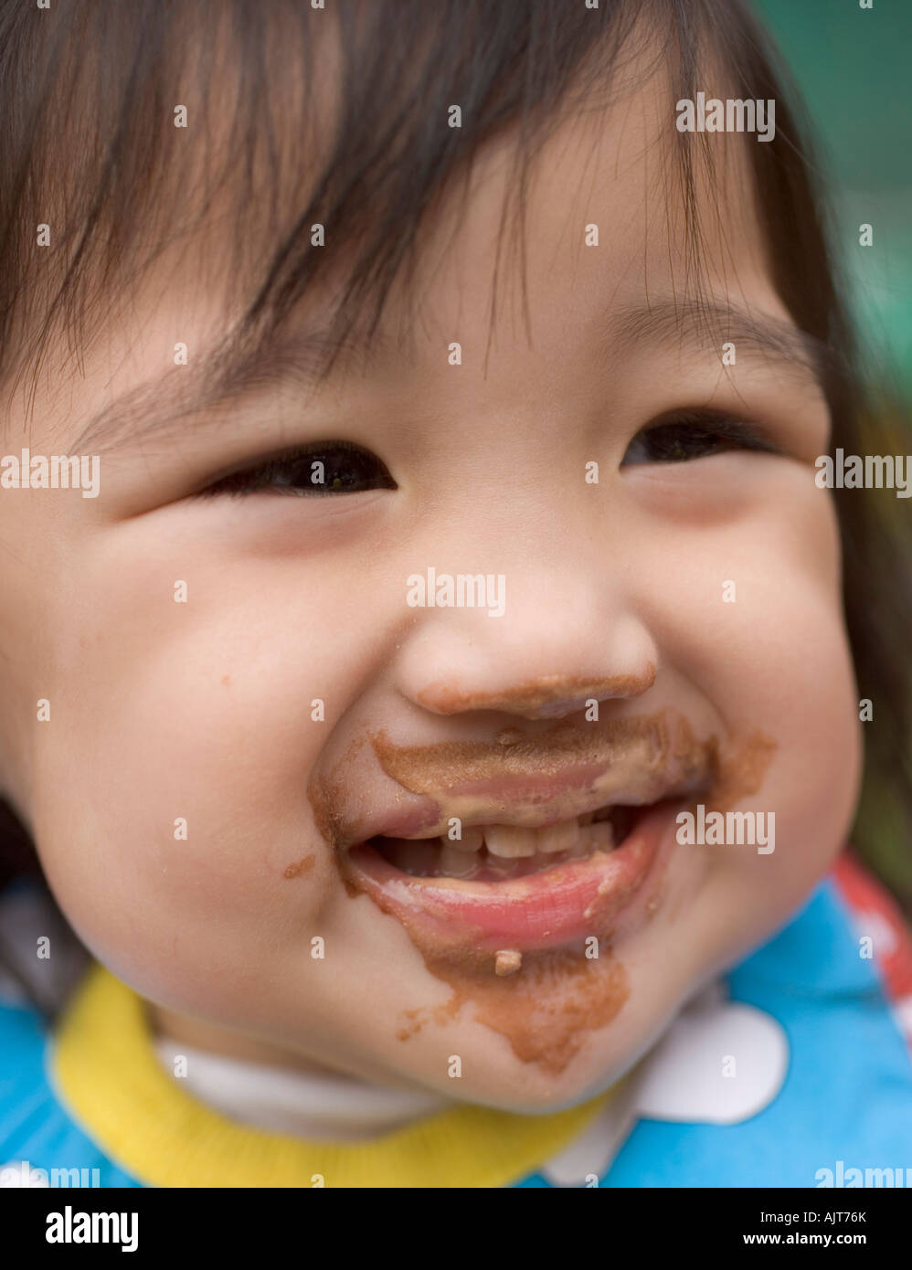 Close-up of a baby girl smiling Stock Photo - Alamy