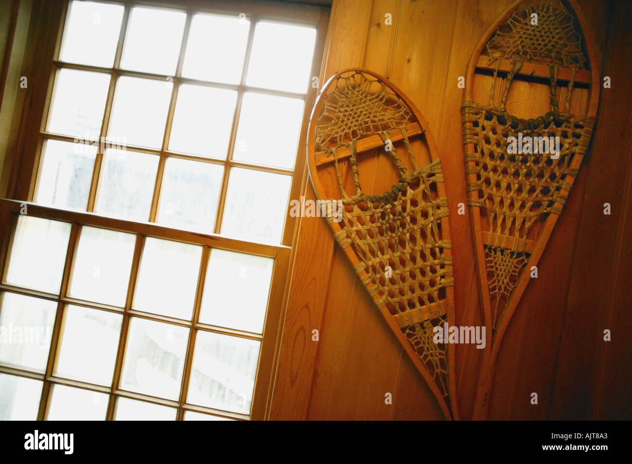 Snowshoes on wall Stock Photo Alamy