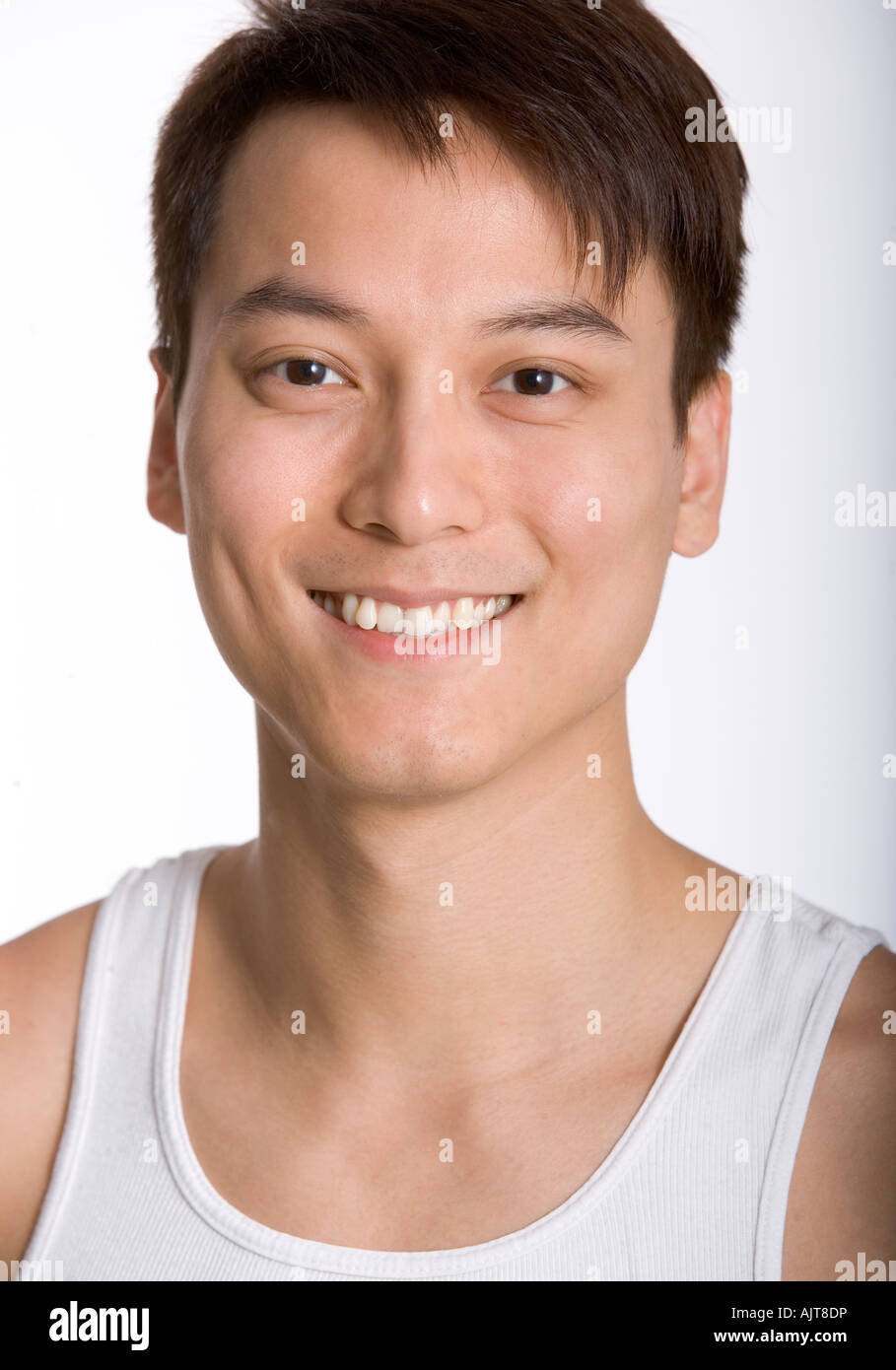Portrait of a young man smiling Stock Photo - Alamy