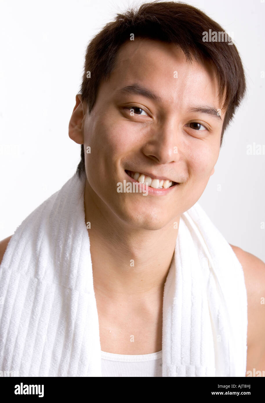 Portrait of a young man smiling Stock Photo - Alamy