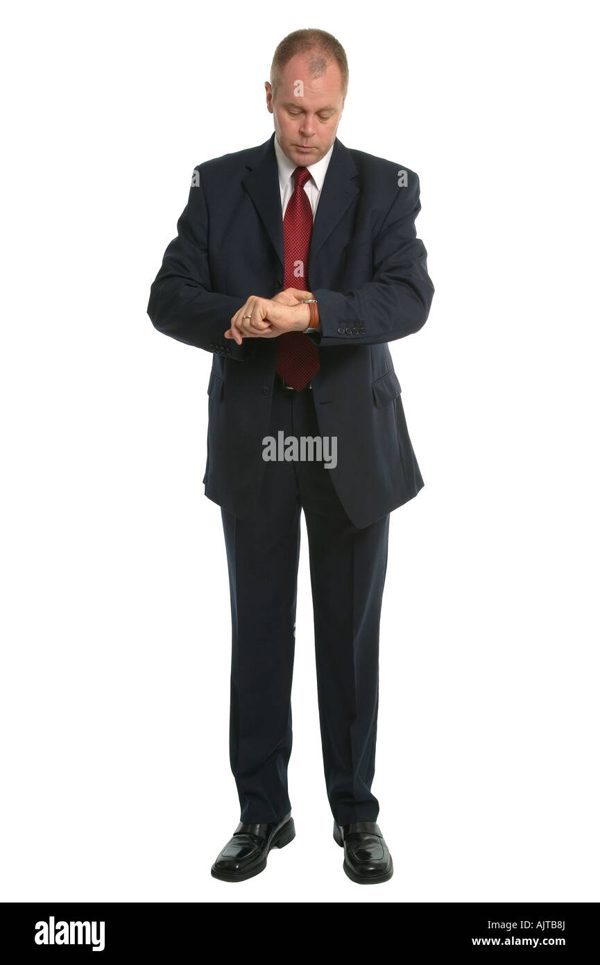 Businessman checking the time on his wristwatch Stock Photo