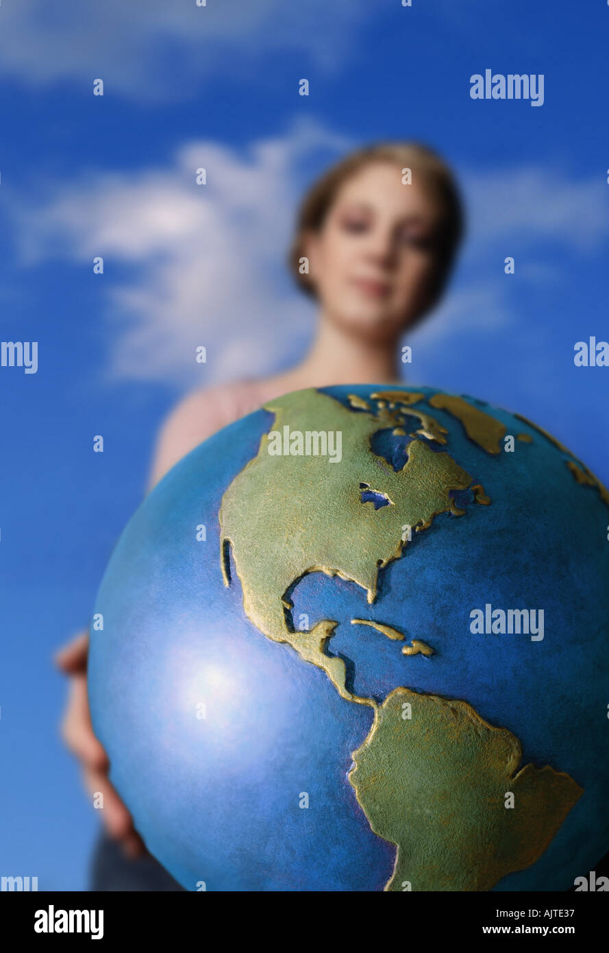 Hand holding globe woman hi-res stock photography and images - Alamy