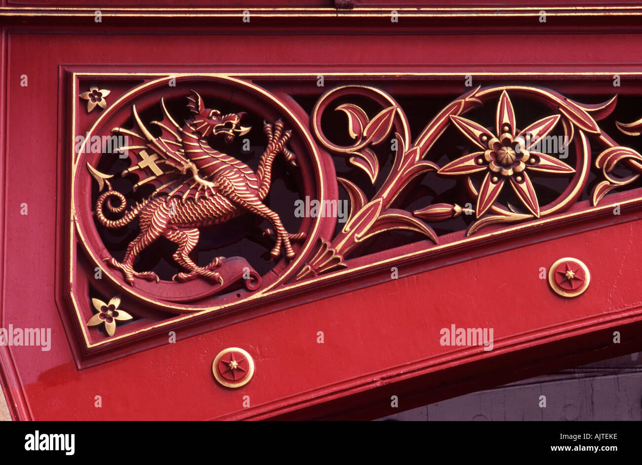 Victorian engineering: red dragon - emblem of the City of London - and floral design on spandrel of Holborn Viaduct Stock Photo