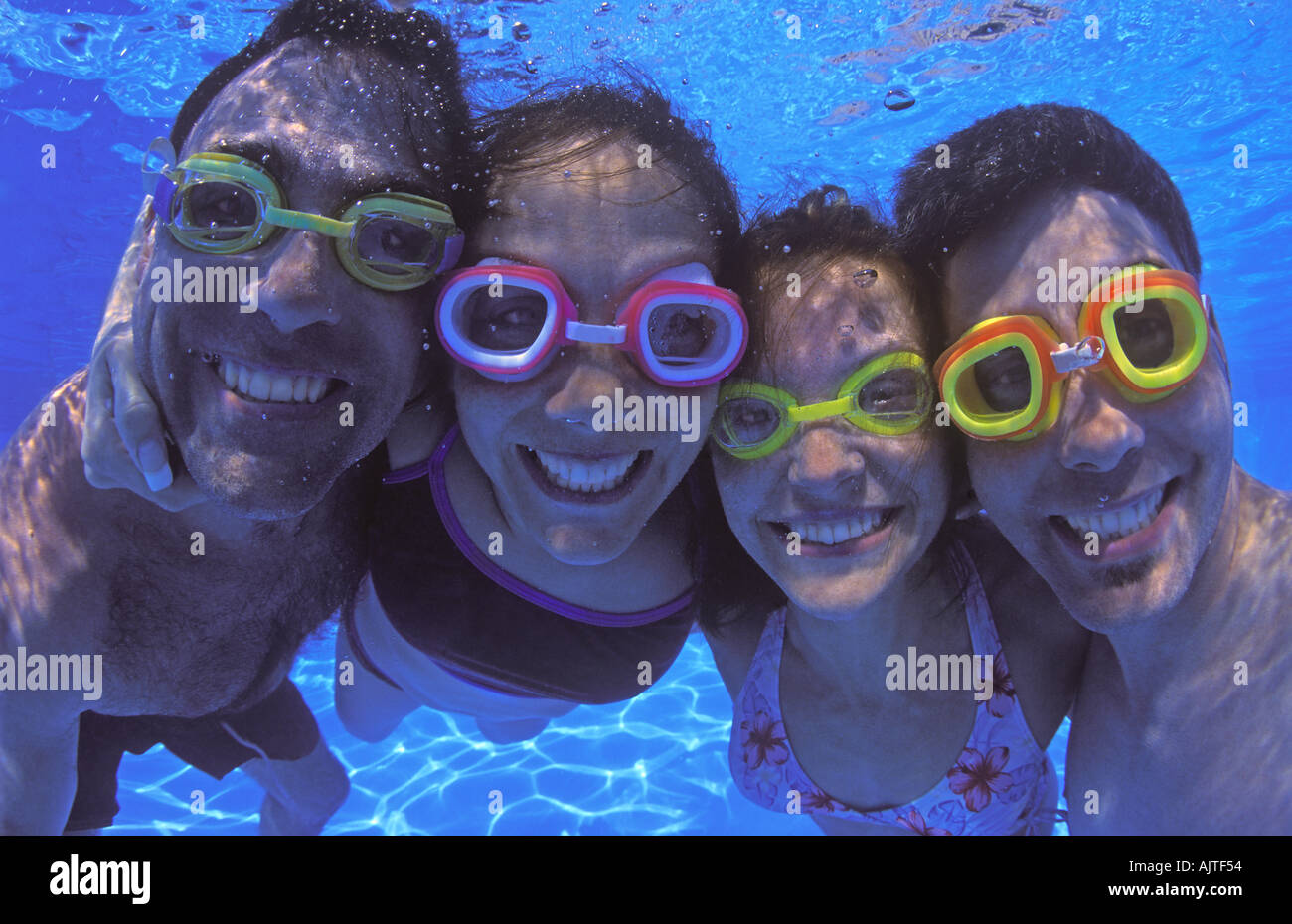 Group in swimming pool Stock Photo - Alamy