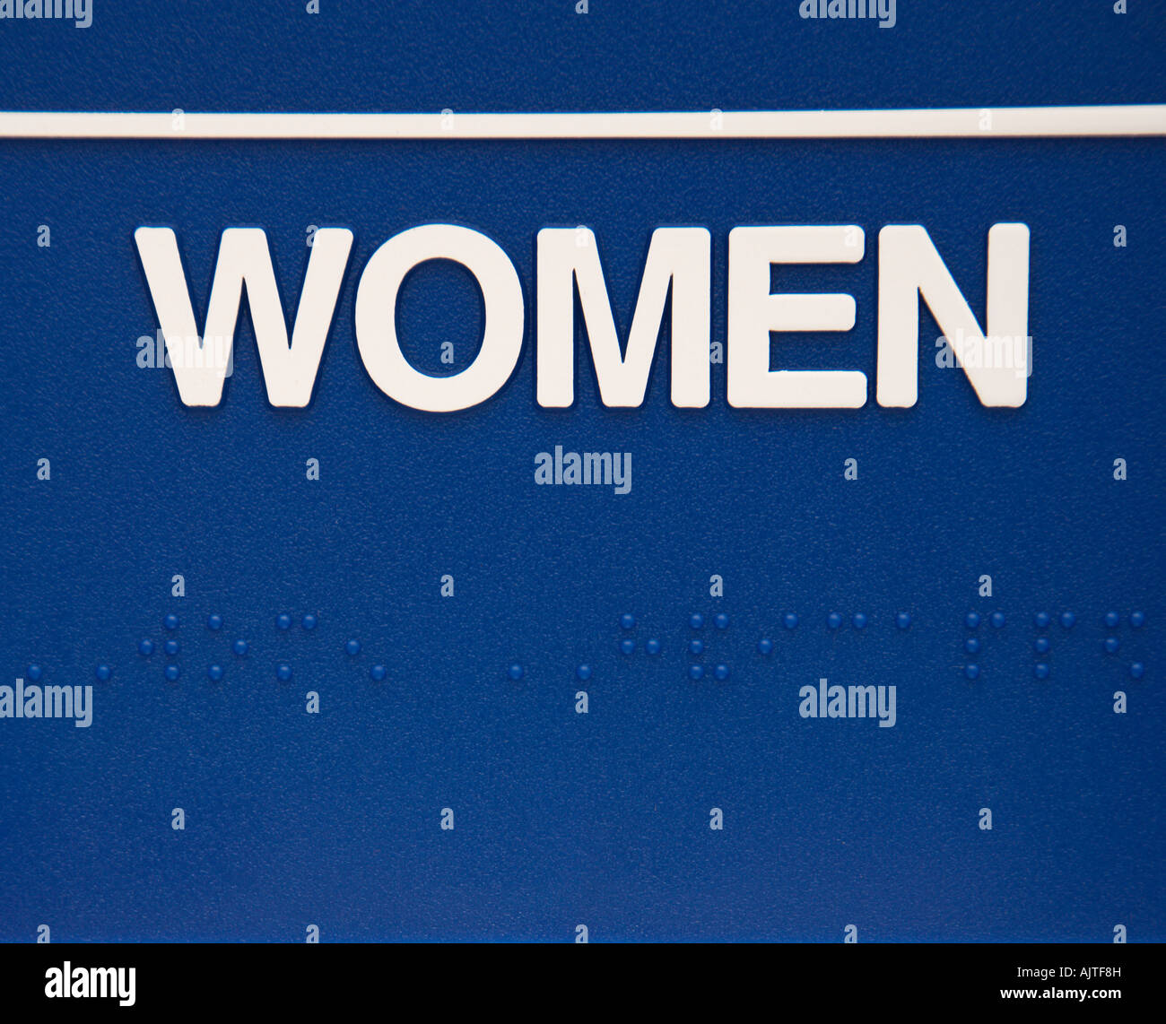 Blue women sign with braille Stock Photo - Alamy