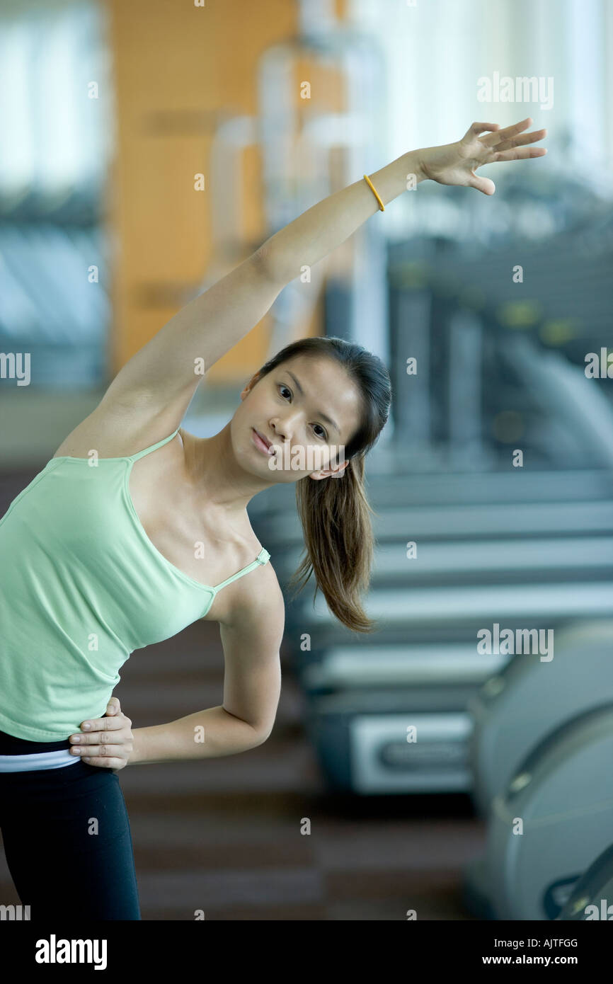 Portrait of a young woman exercising Stock Photo - Alamy