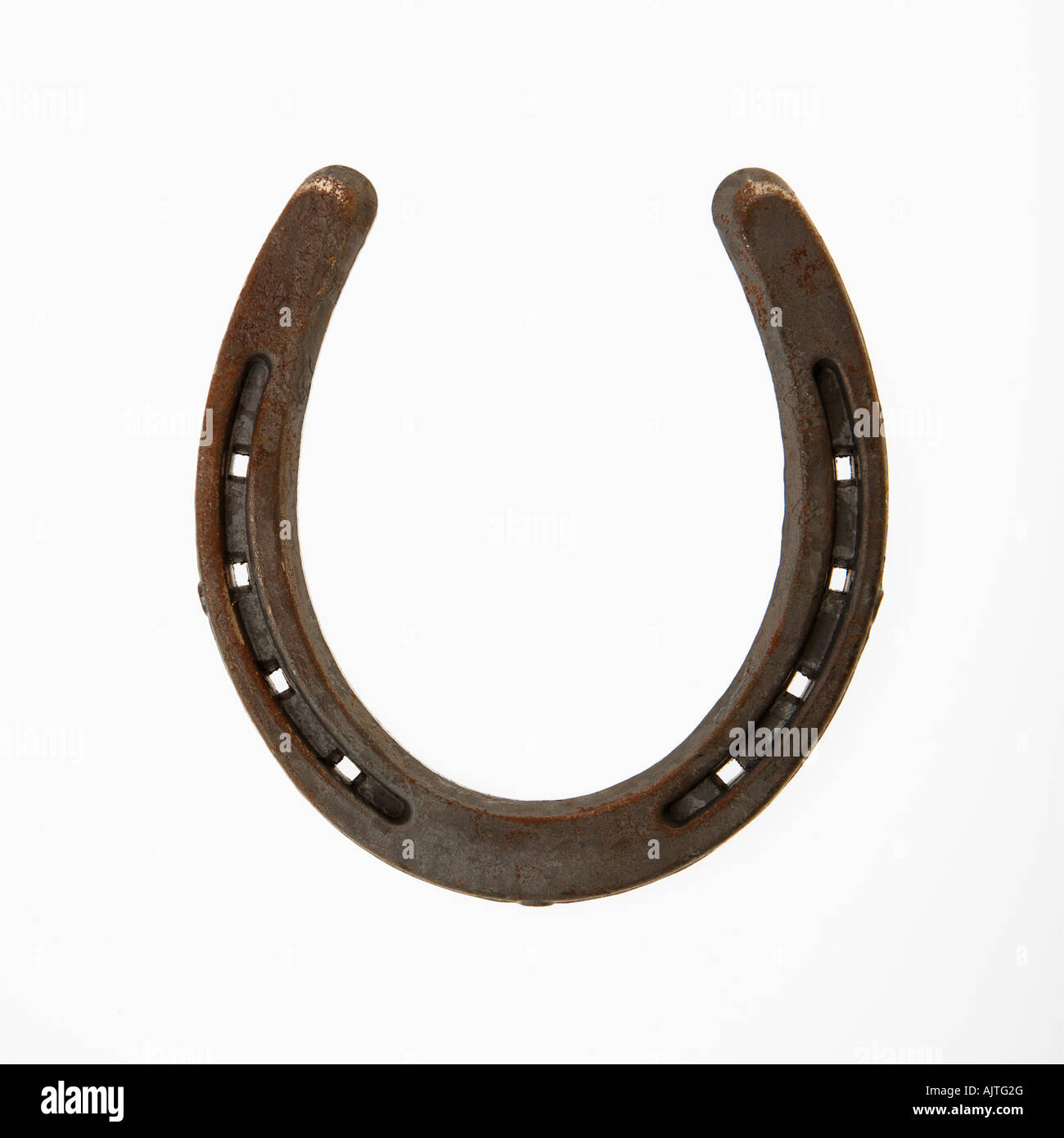 Upside down horseshoe against white background Stock Photo Alamy