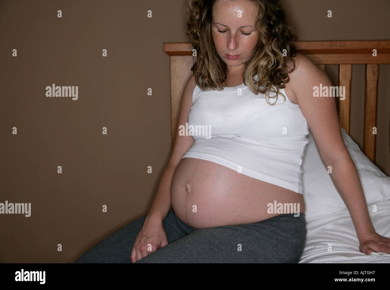 Pregnant woman who cannot sleep depressed Stock Photo