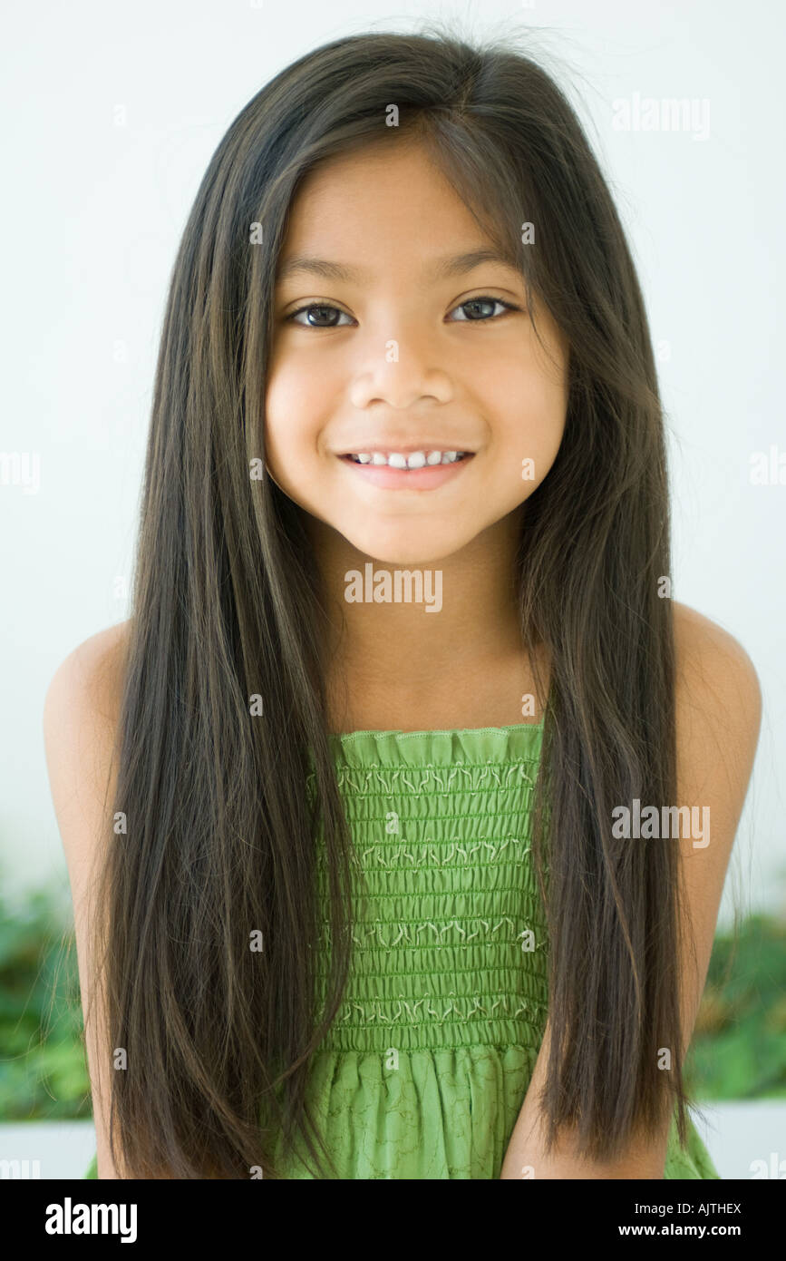 Girl smiling at camera, portrait Stock Photo - Alamy