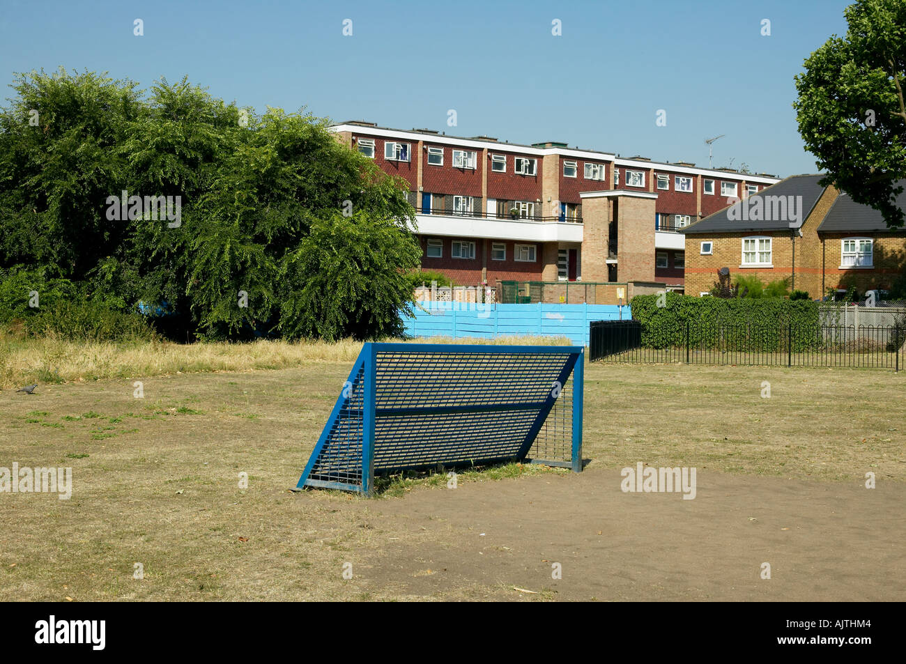 Housing, KingstonUponThames, Surrey. Metal goal with housing in the background Stock Photo Alamy
