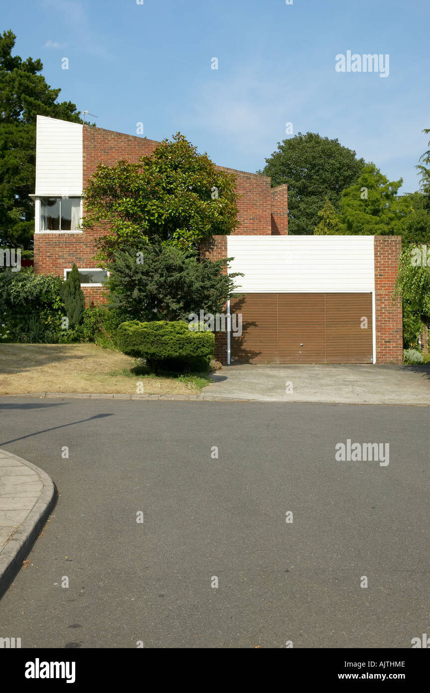 Housing, KingstonUponThames, Surrey. Half brick half timber clad house with garage Stock Photo