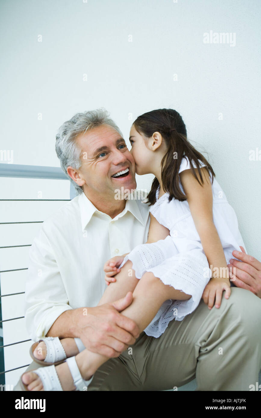 Girl Sitting On Boy Lap