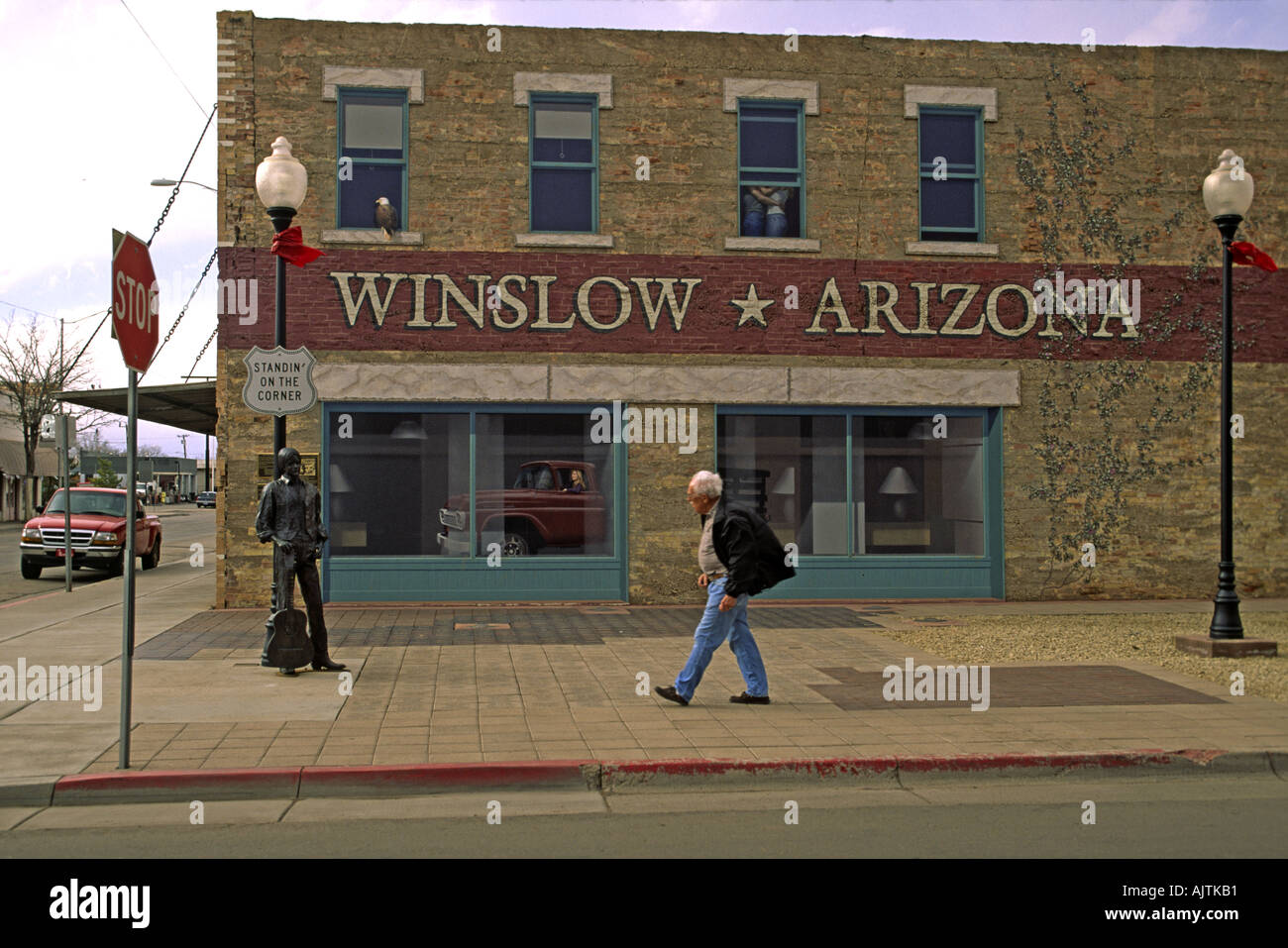 Standin' on a Corner, Eagles song, statue, mural on Route 66 in Winslow, Arizona, USA Stock Photo