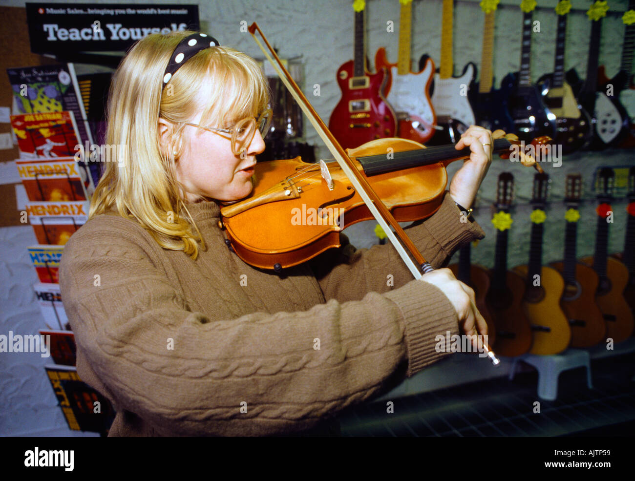 Violin Music Shop Bowing Strings Of Violin Stock Photo