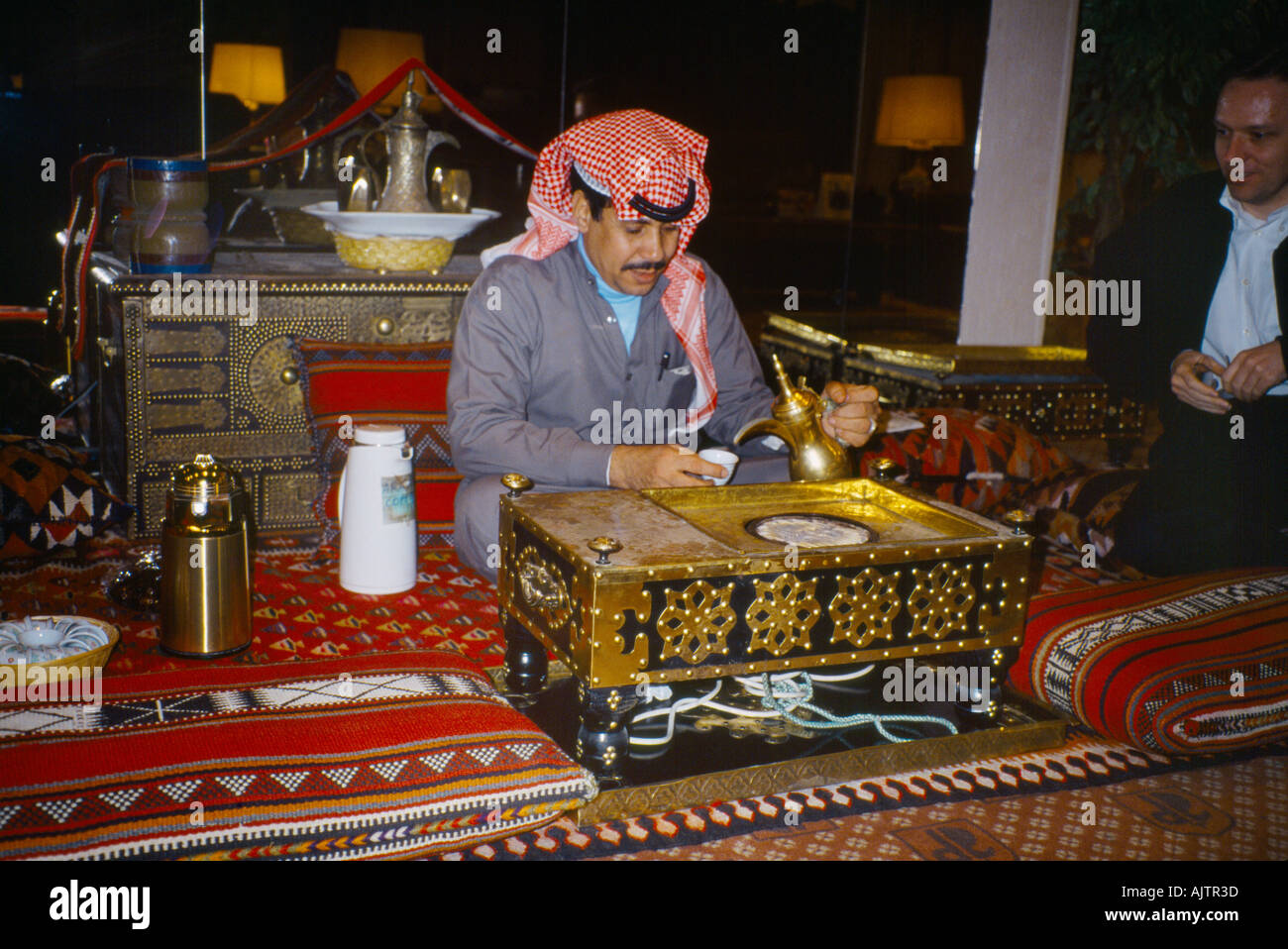 Kuwait Man Pouring Coffee Brass Coffee Pot Stock Photo