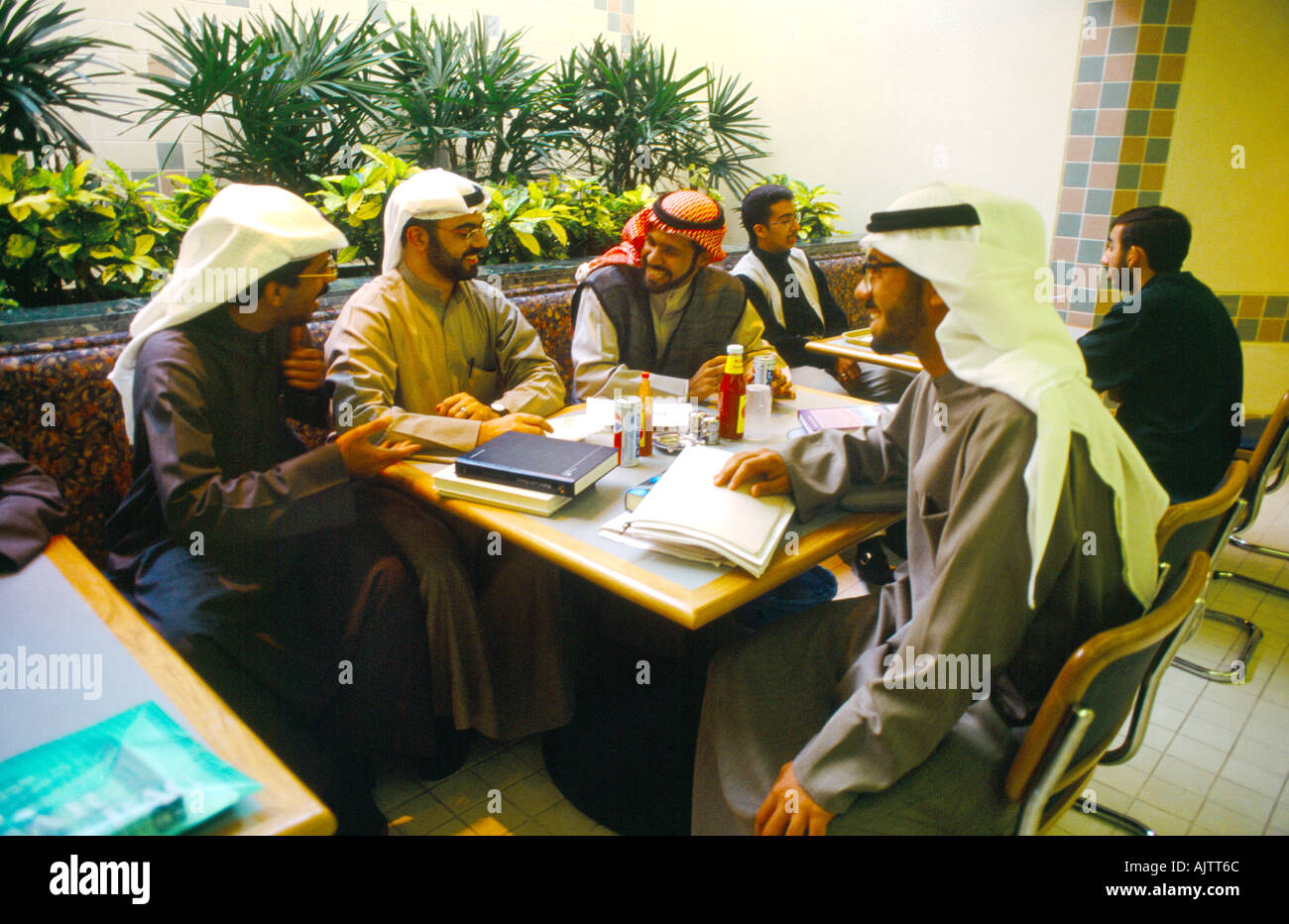 Kuwait City Kuwait Students Talking in University Canteen Stock Photo