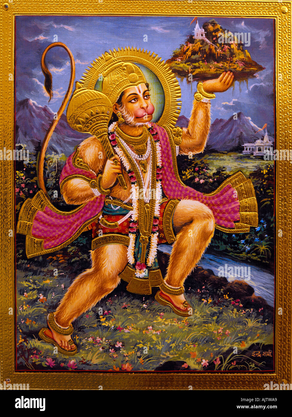 Hanuman Hindu God and Divine Vanara holding the Himalayan Mountain Dronagiri Parvat and the Gada Stock Photo